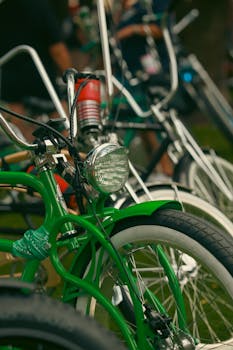 A row of vibrant bicycles lined up outdoors showcasing unique designs and colors.