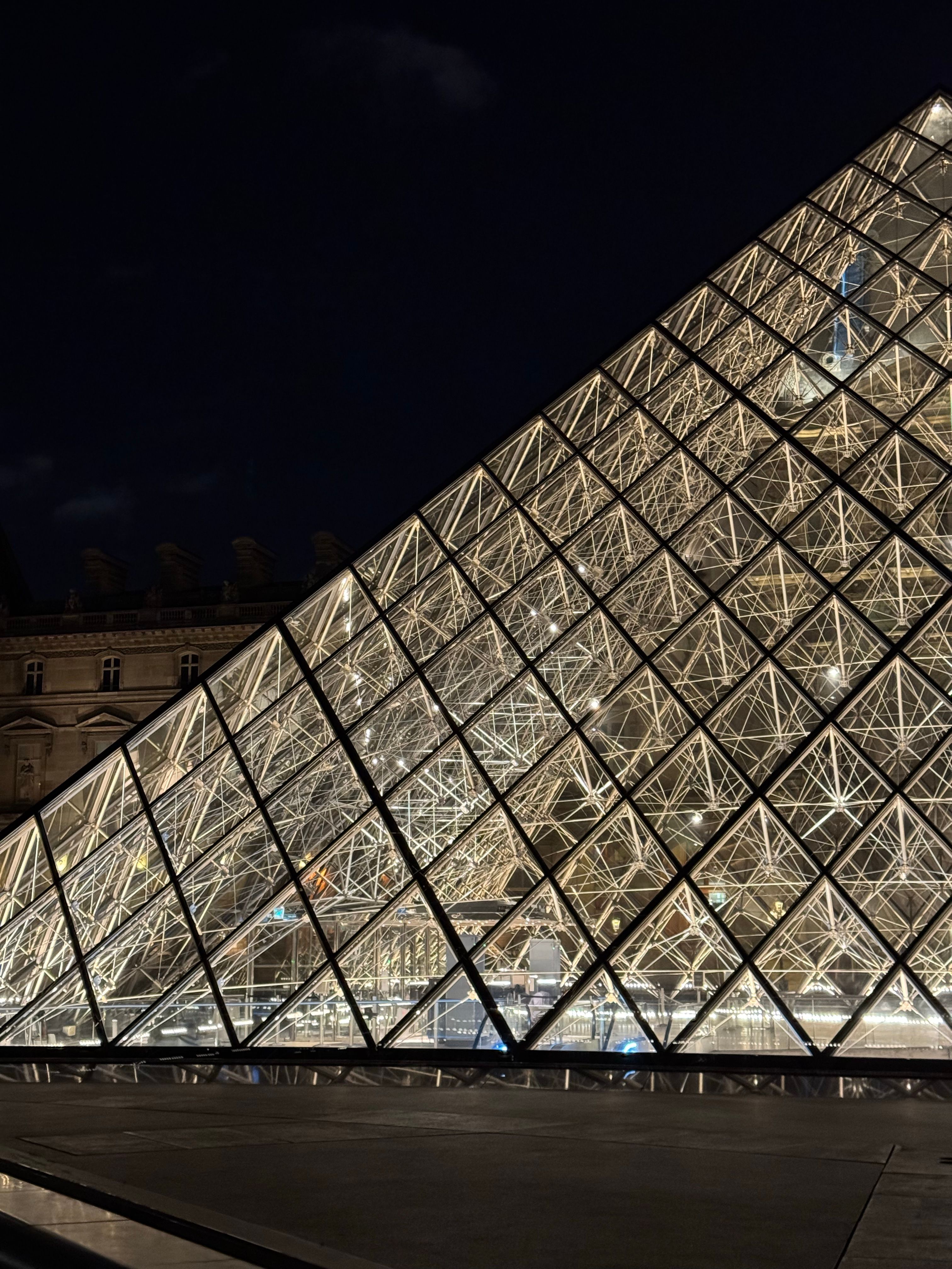 Illuminated Louvre Pyramid at Night in Paris · Free Stock Photo