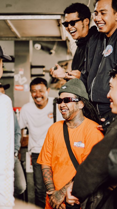 Free A group of friends sharing laughter and joy in East Java, showcasing vibrant Indonesian culture. Stock Photo