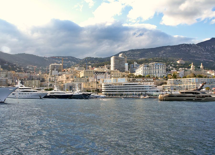 Explore the breathtaking skyline and luxury yachts at Monaco's picturesque harbor.