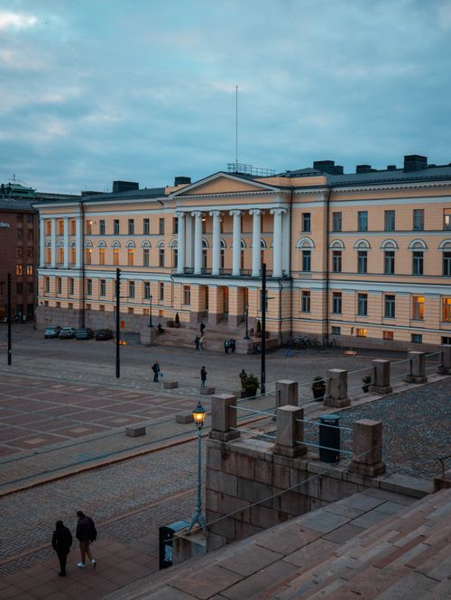 Free View of the historic University of Helsinki building in Uusimaa, Finland at dusk. Stock Photo