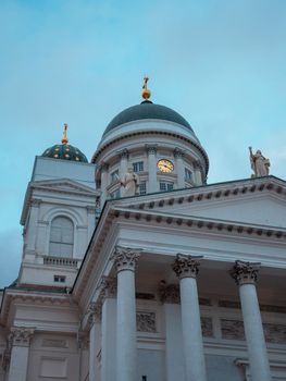 Elegant architectural details of Helsinki Cathedral against a vibrant sky.