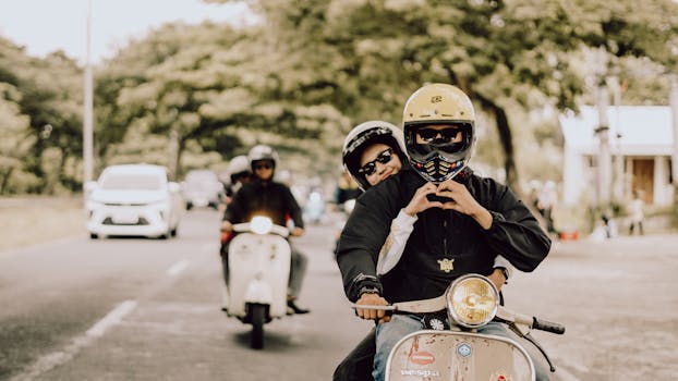 Enjoying a joyful scooter ride on a sunny day in East Java, Indonesia.