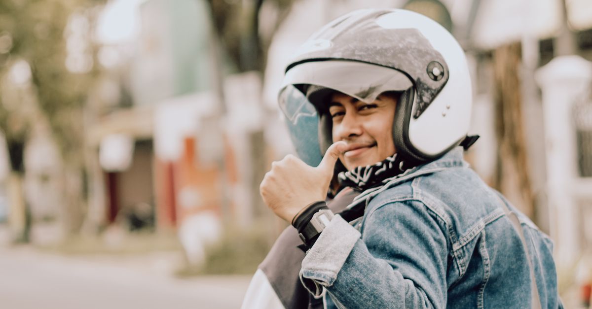 Java Street Rider Smiling Rider on Vespa in East Java Street · Free Stock Photo