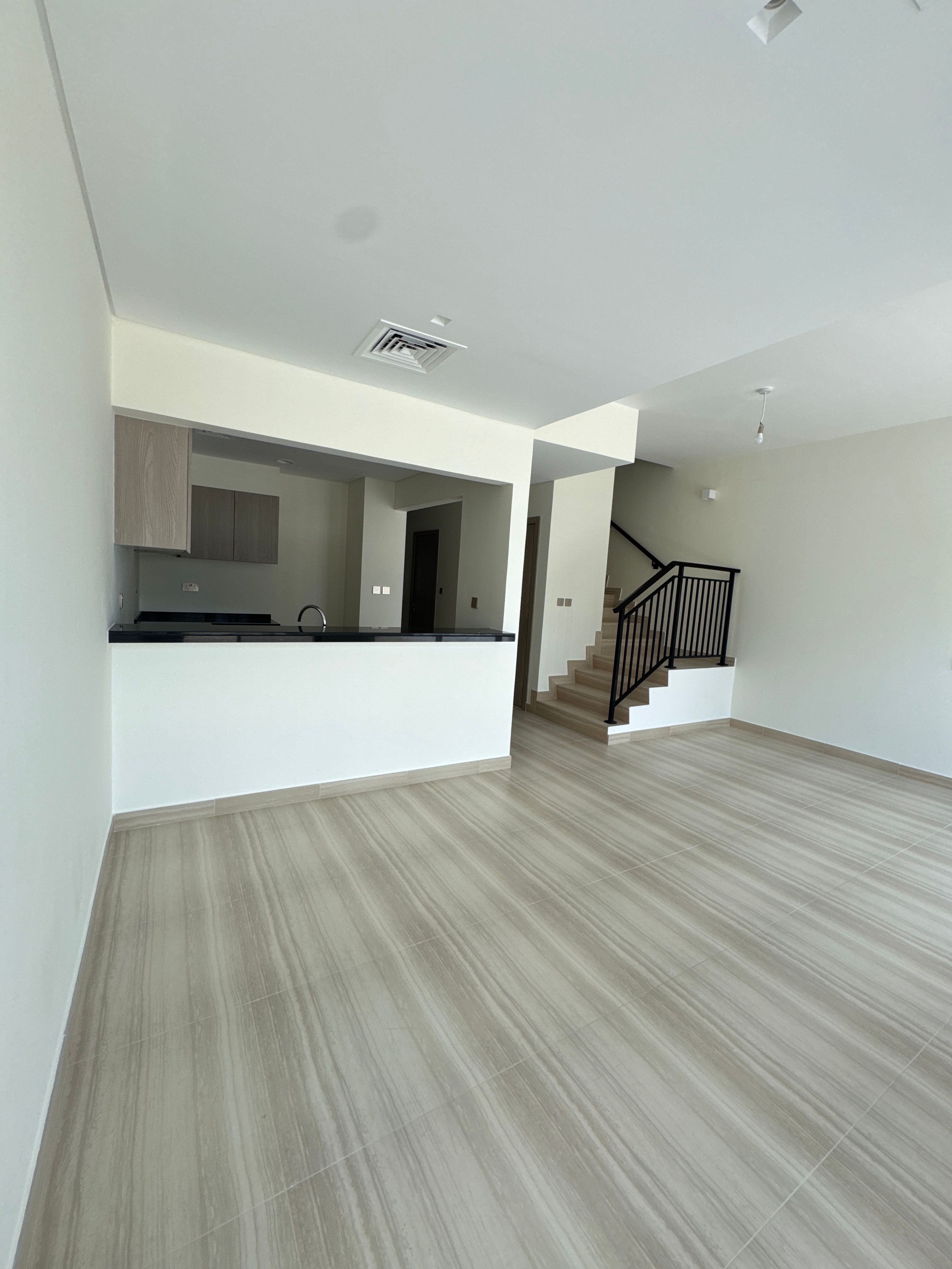 Spacious Modern Living Room with Kitchen View · Free Stock Photo