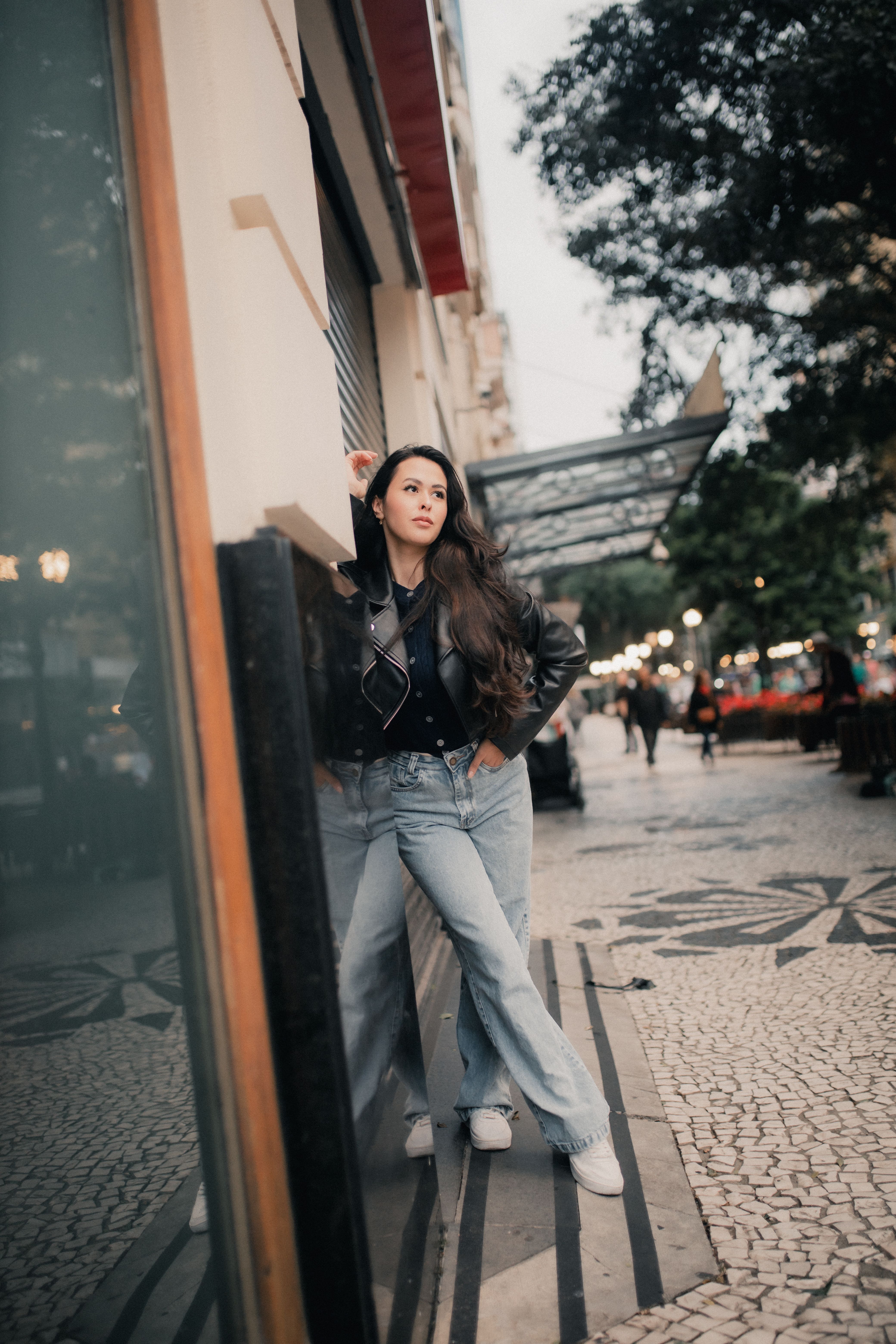 Stylish Woman Posing in Urban Street Setting · Free Stock Photo