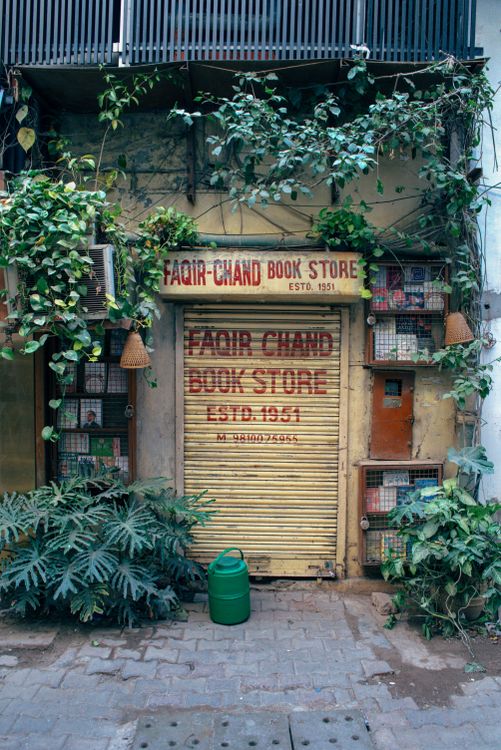 Rustic Bookstore Rustic Urban Bookstore Facade with Greenery · Free Stock Photo