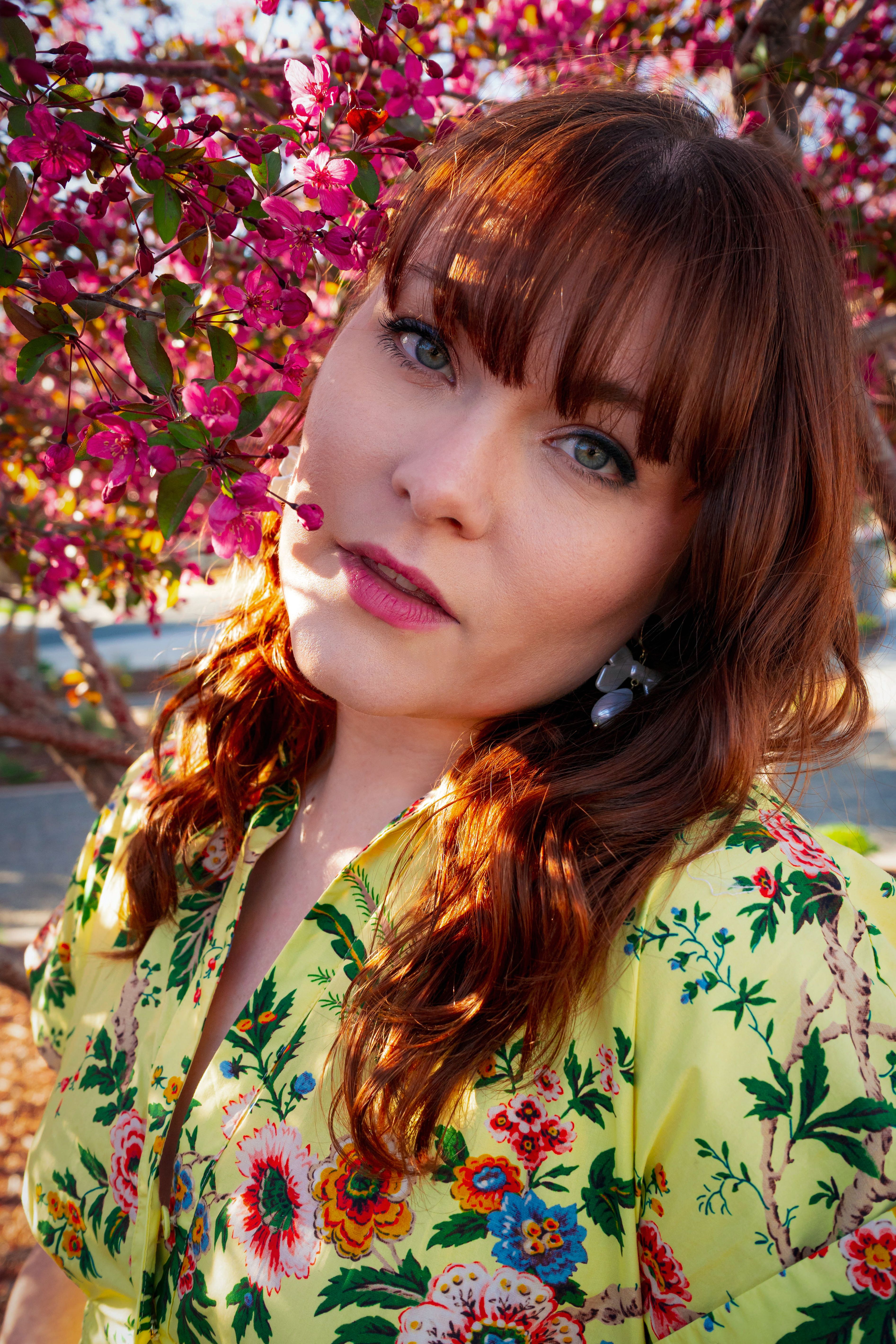Spring Portrait of Woman in Floral Dress · Free Stock Photo