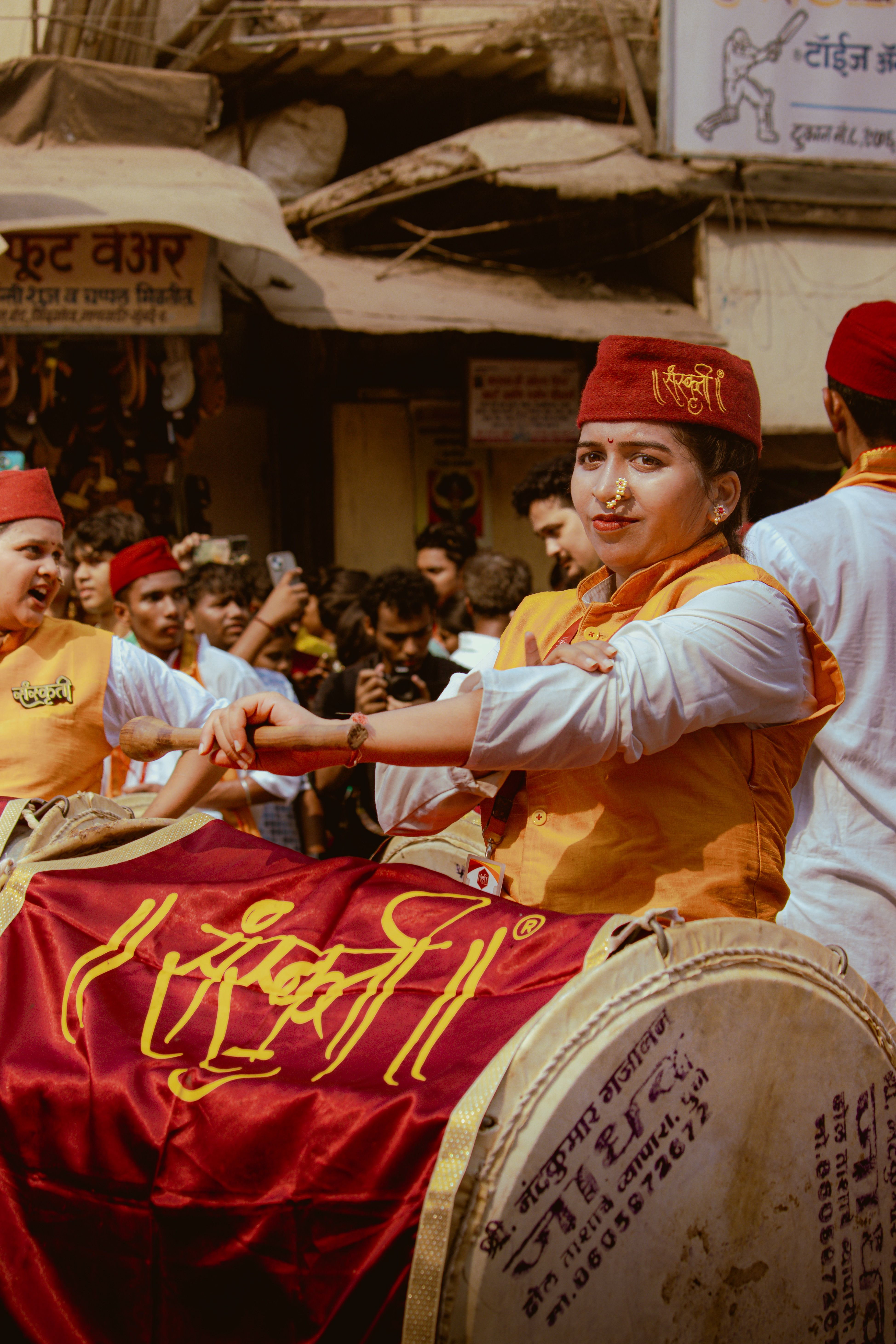Traditional Marathi celebration with vibrant costumes and lively drumming during Gudi Padwa festival in India.