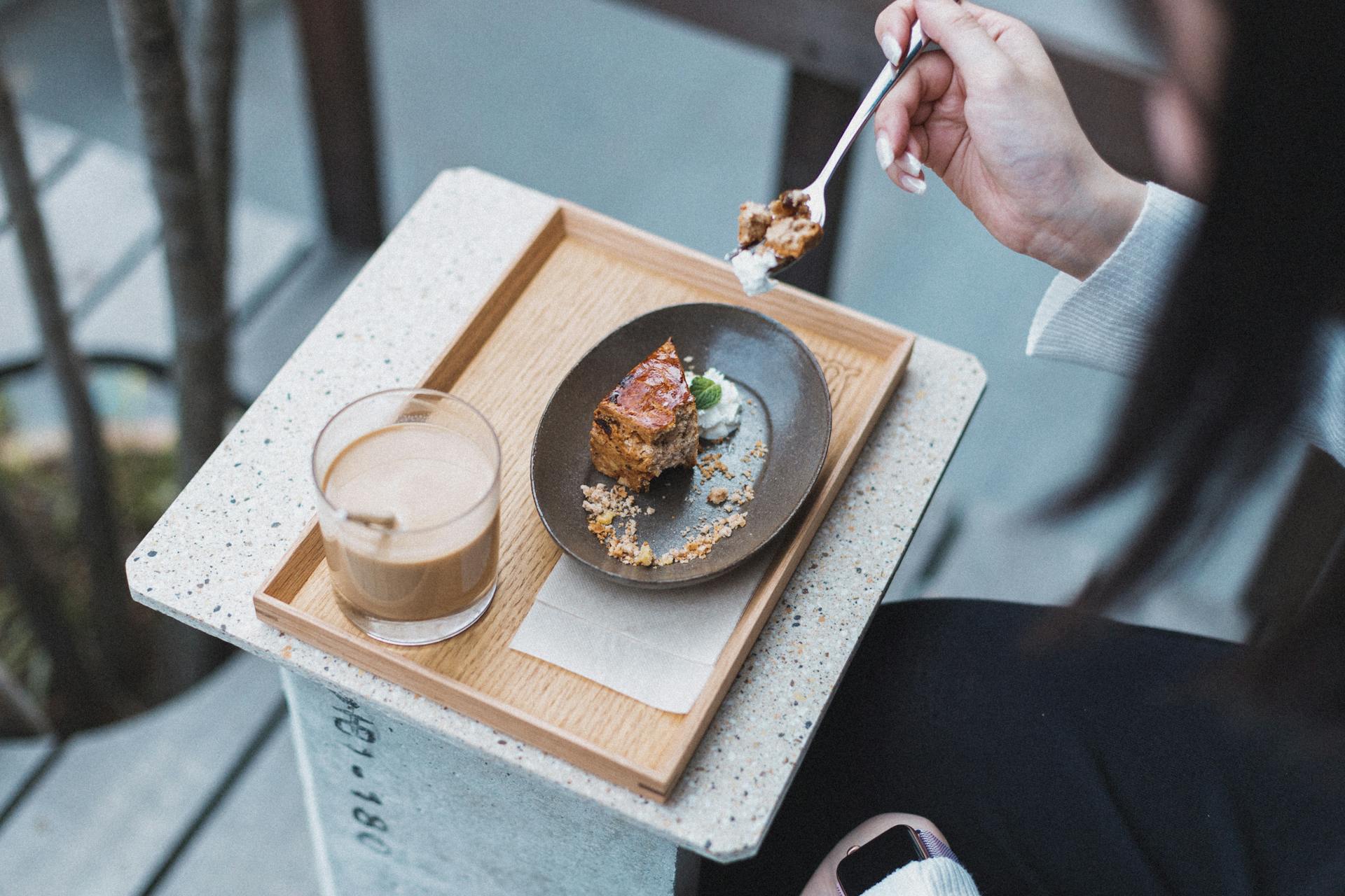 Enjoy a cozy moment with coffee and dessert at a Tokyo cafe. Perfect for lifestyle and food lovers.