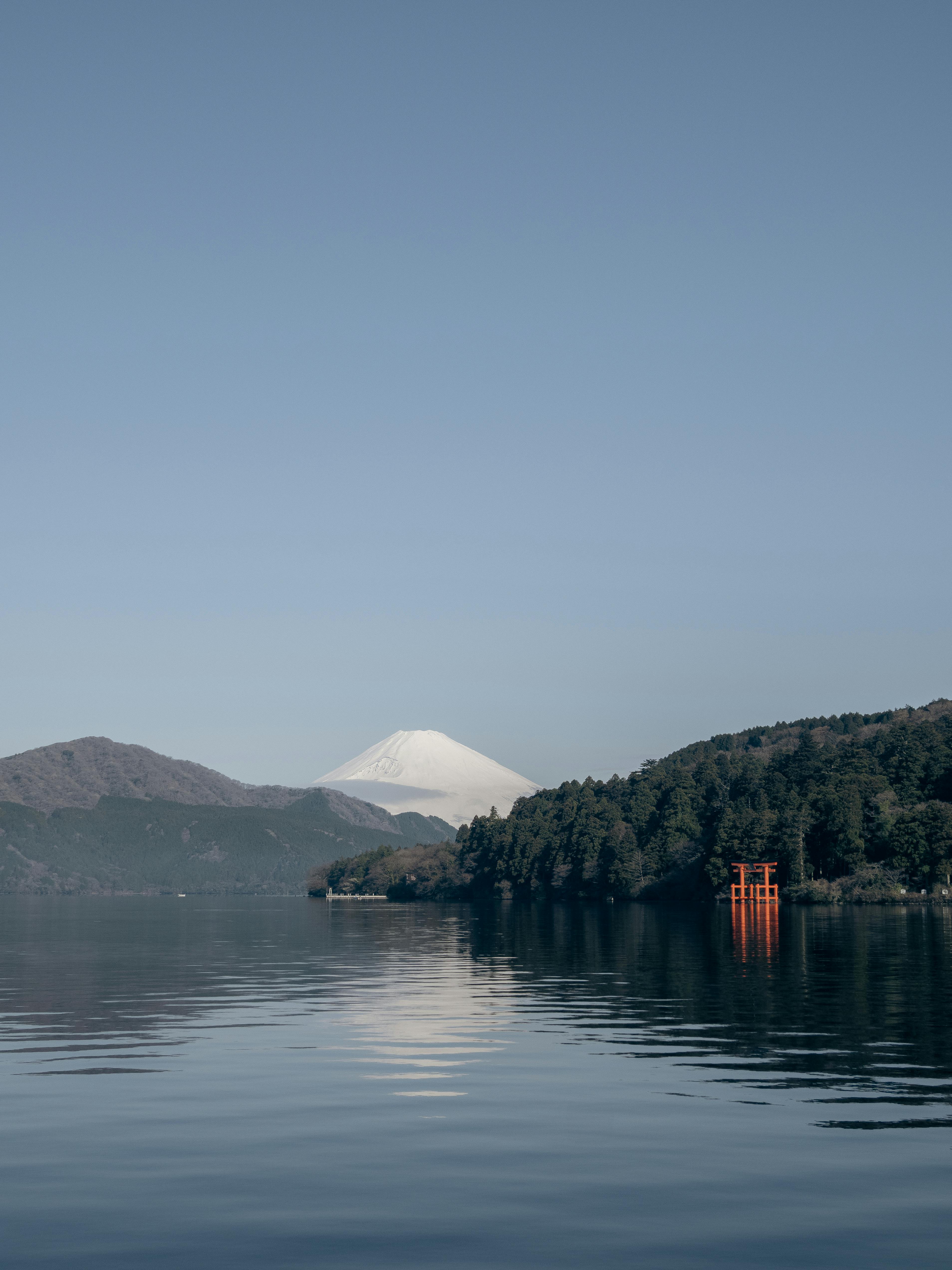 stunning view of mount fuji with torii gate