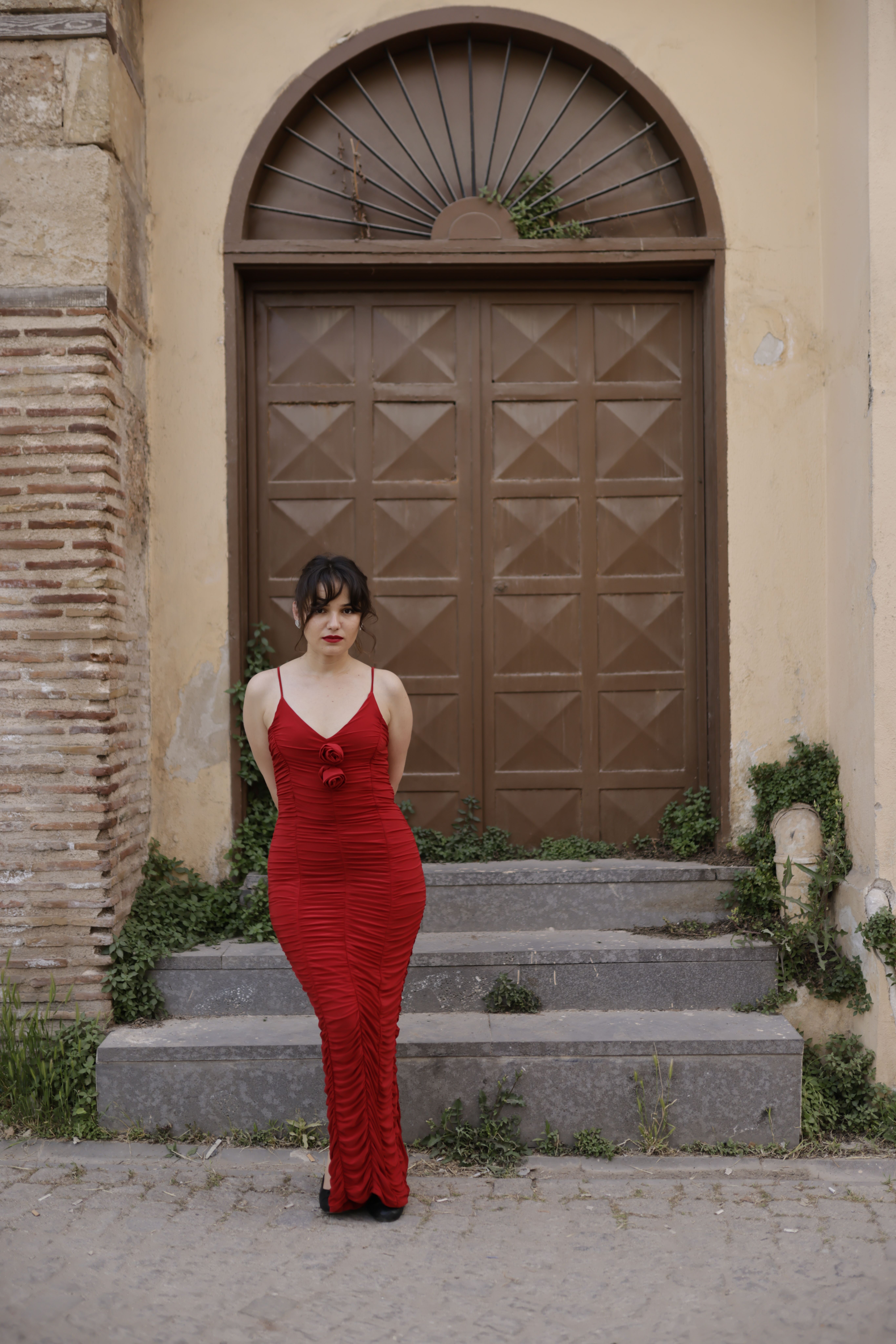 Woman in Red Dress by Rustic Doorway · Free Stock Photo
