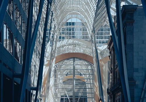 View of a modern atrium with intricate steel and glass design in downtown Toronto, Canada.