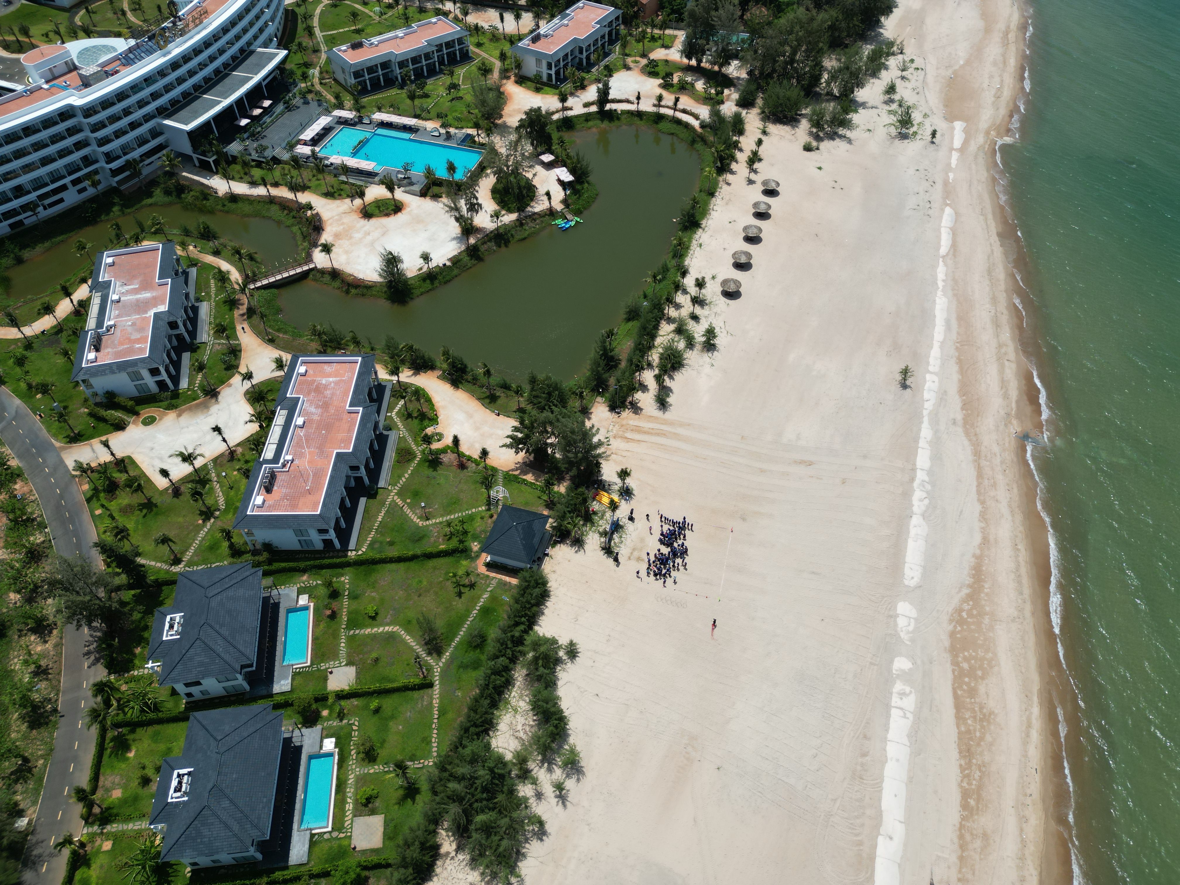 Stunning aerial view of Hồ Tràm resort with beachfront and luxury amenities in vibrant Vietnam.