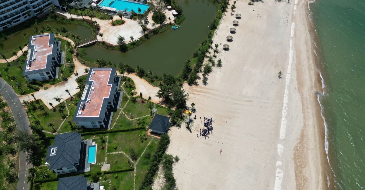 Stunning aerial view of Hồ Tràm resort with beachfront and luxury amenities in vibrant Vietnam.