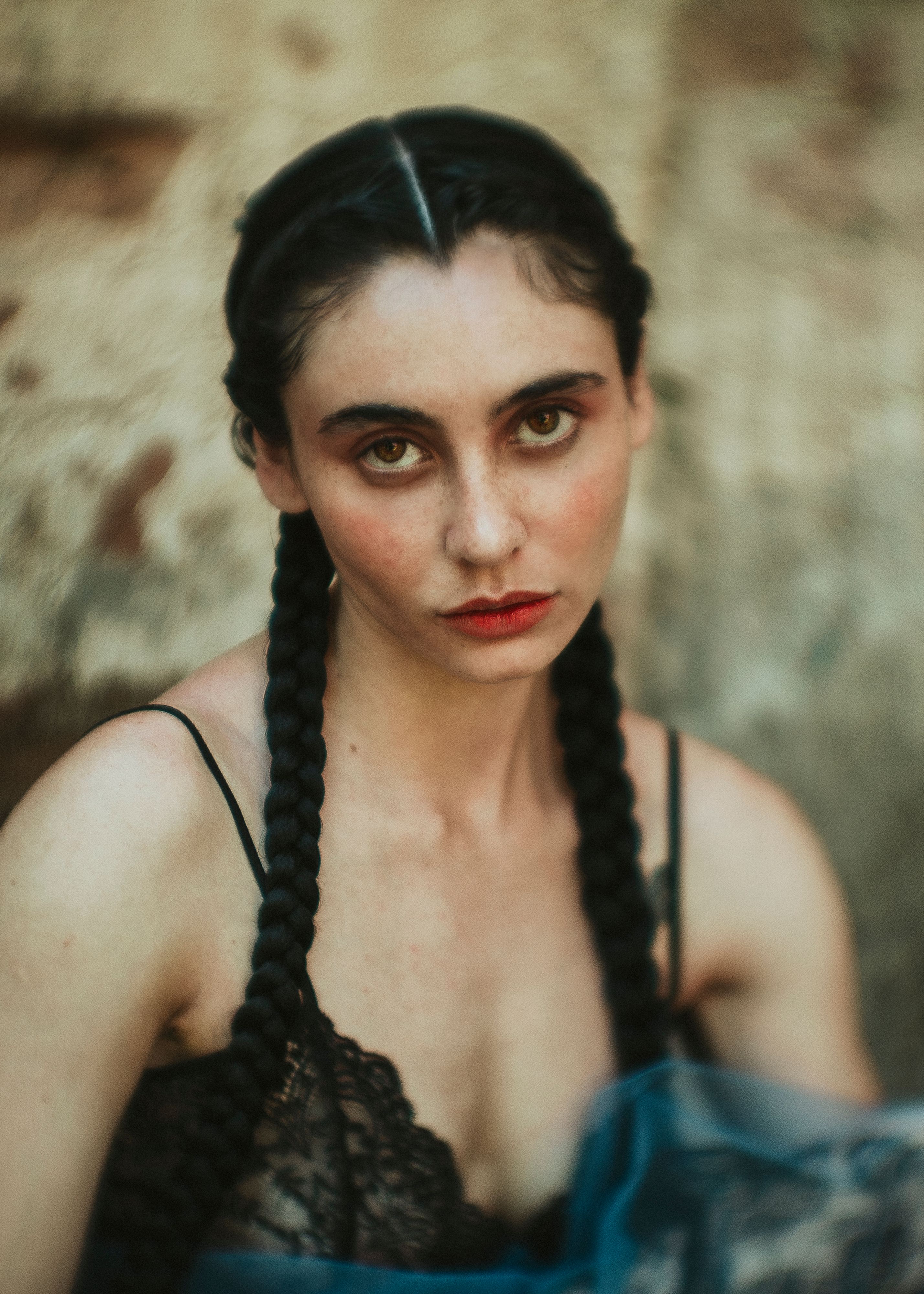 Portrait of a Woman with Braided Hair · Free Stock Photo