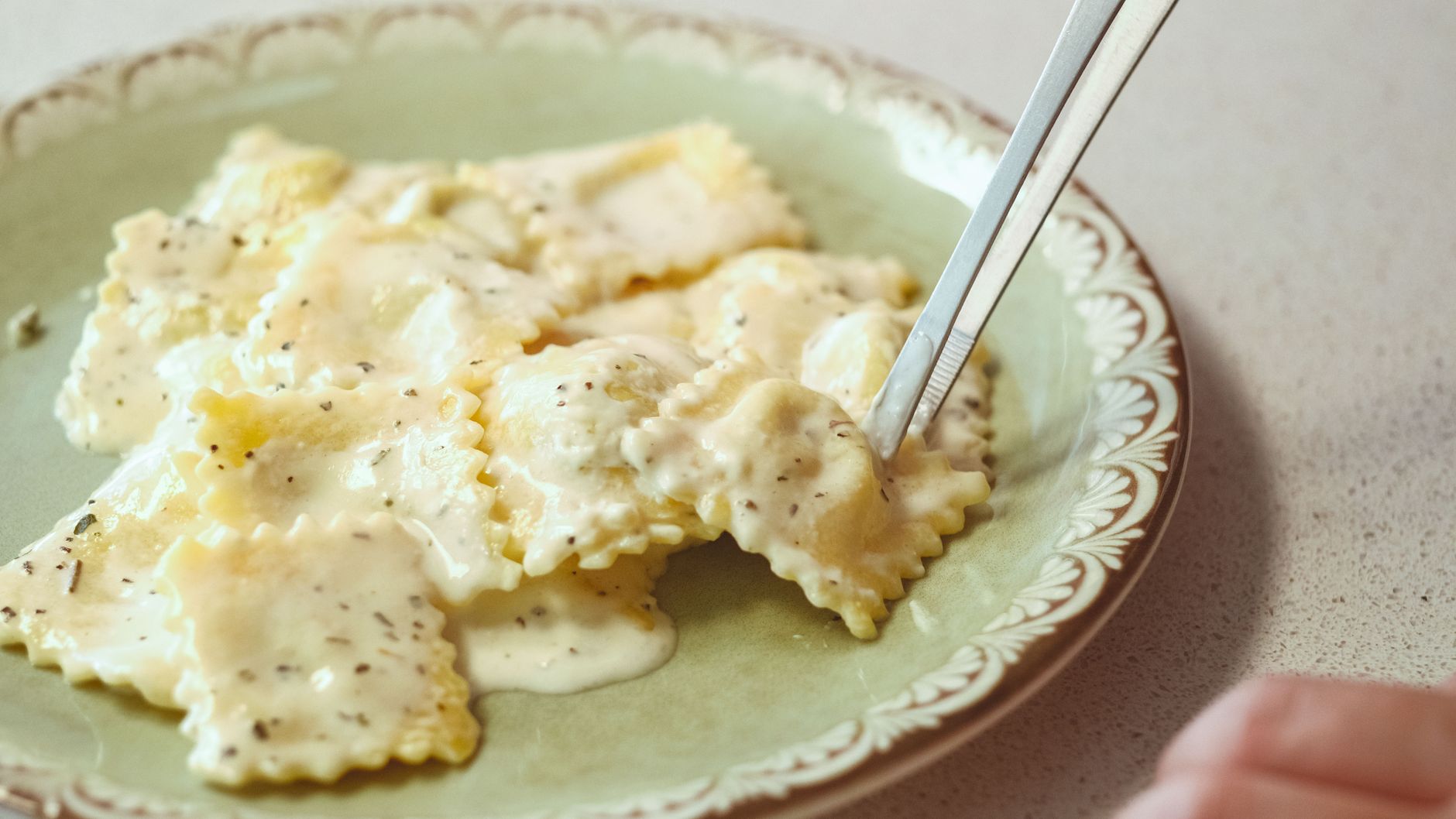 Ricotta ravioli glossed with butter