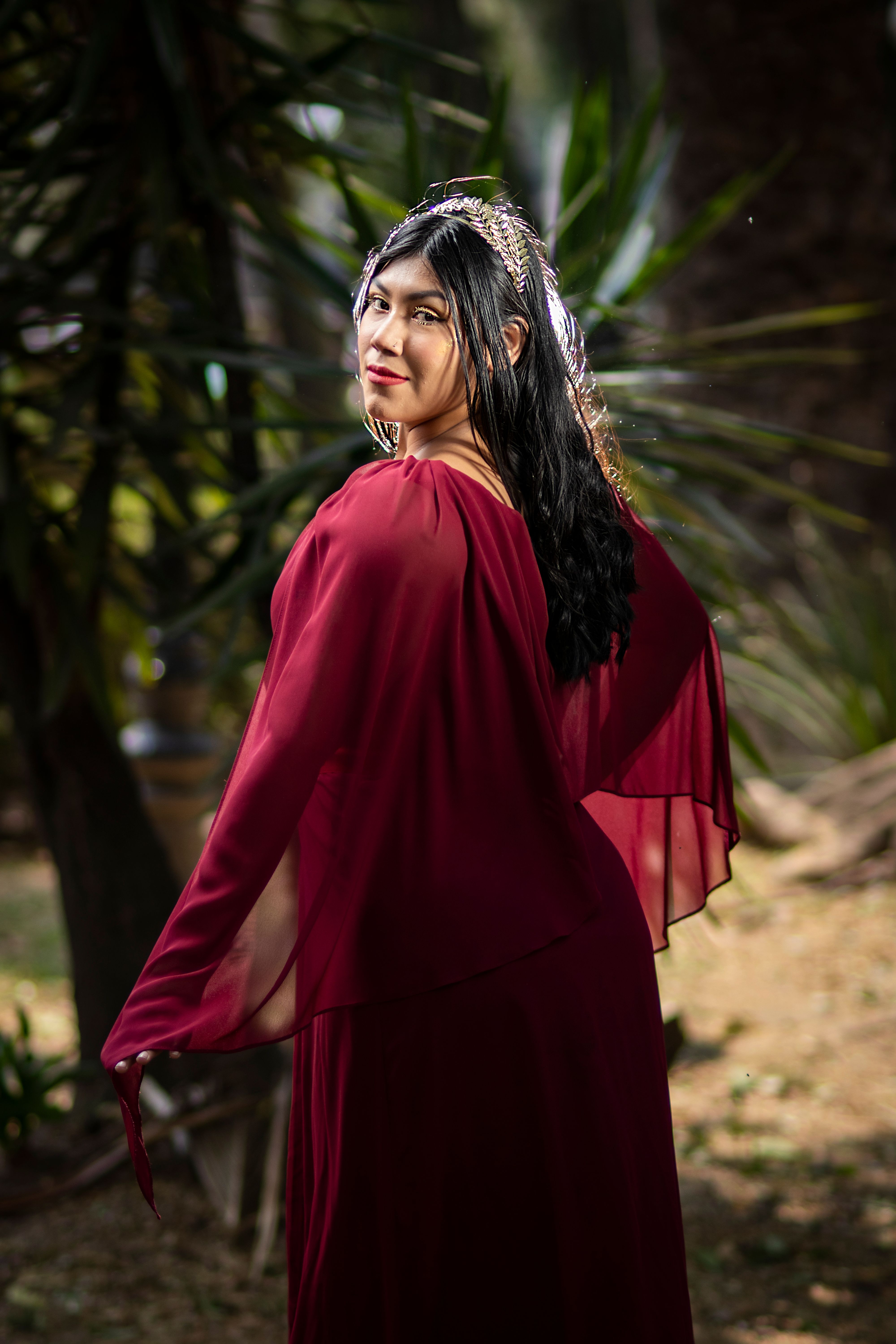 Woman Posing in a Red Dress Outdoors · Free Stock Photo