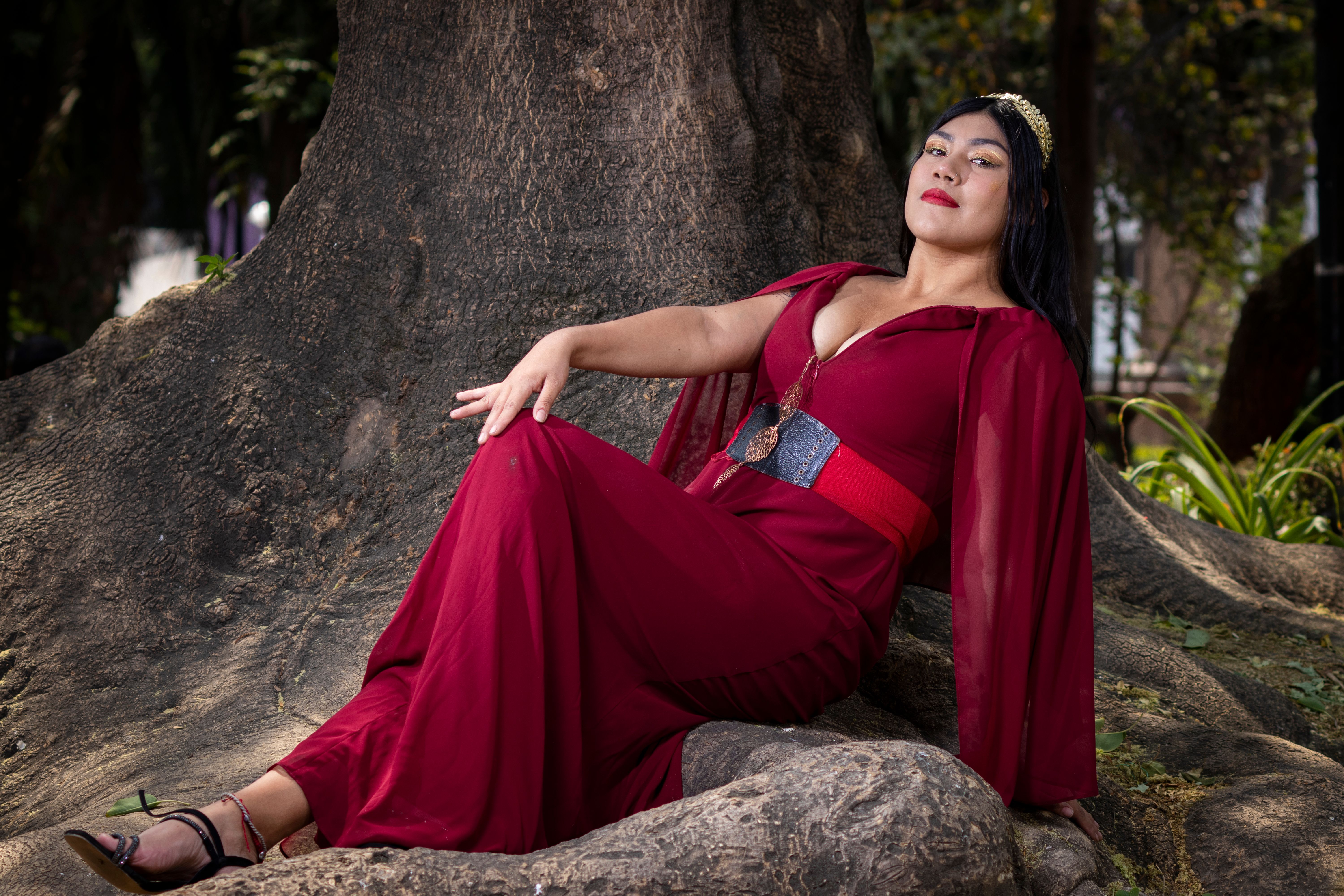 Woman Posing in a Red Dress Outdoors · Free Stock Photo