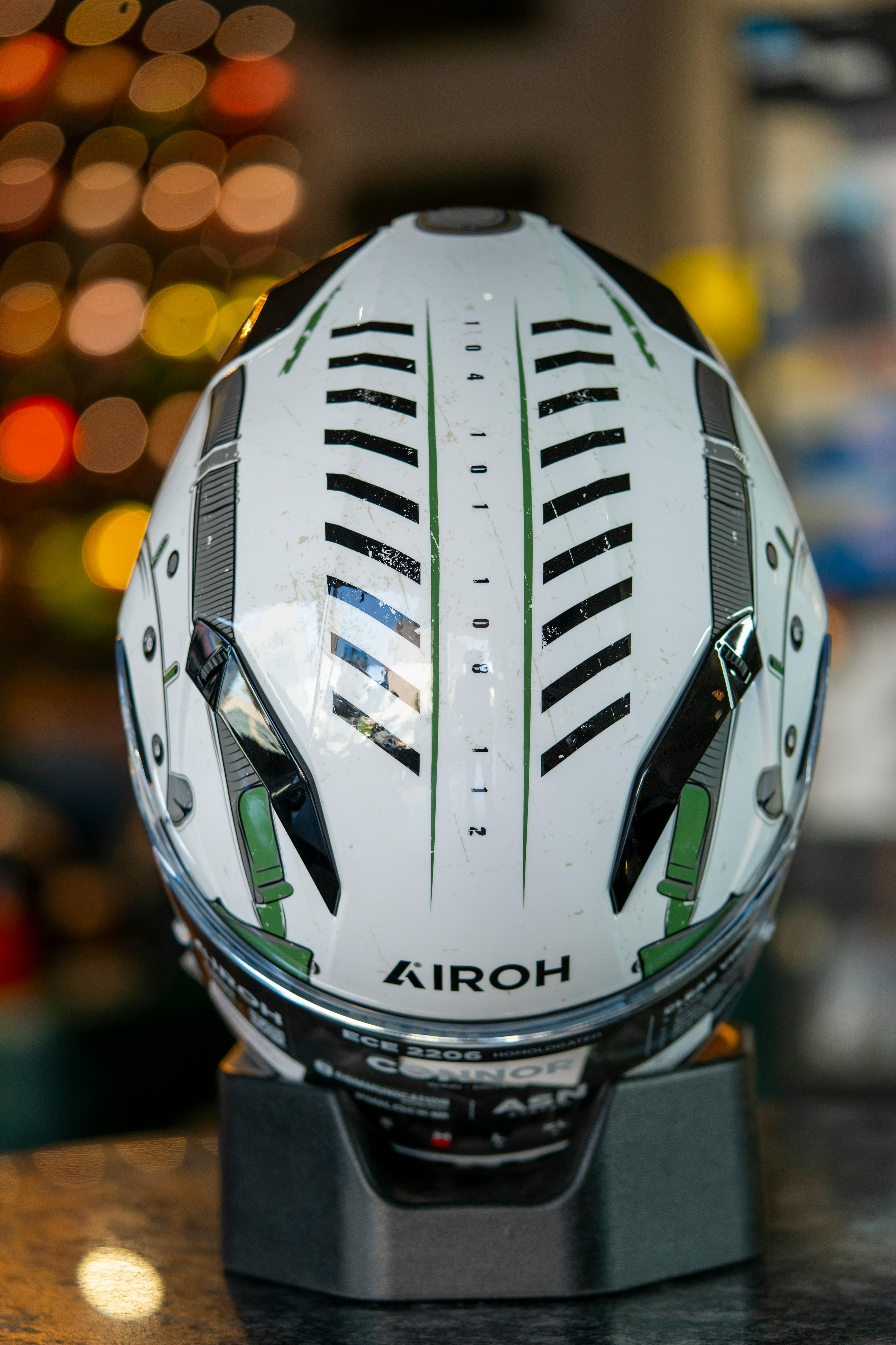 Airoh design helmet showcased with a modern and futuristic look, perfect for bike enthusiasts.