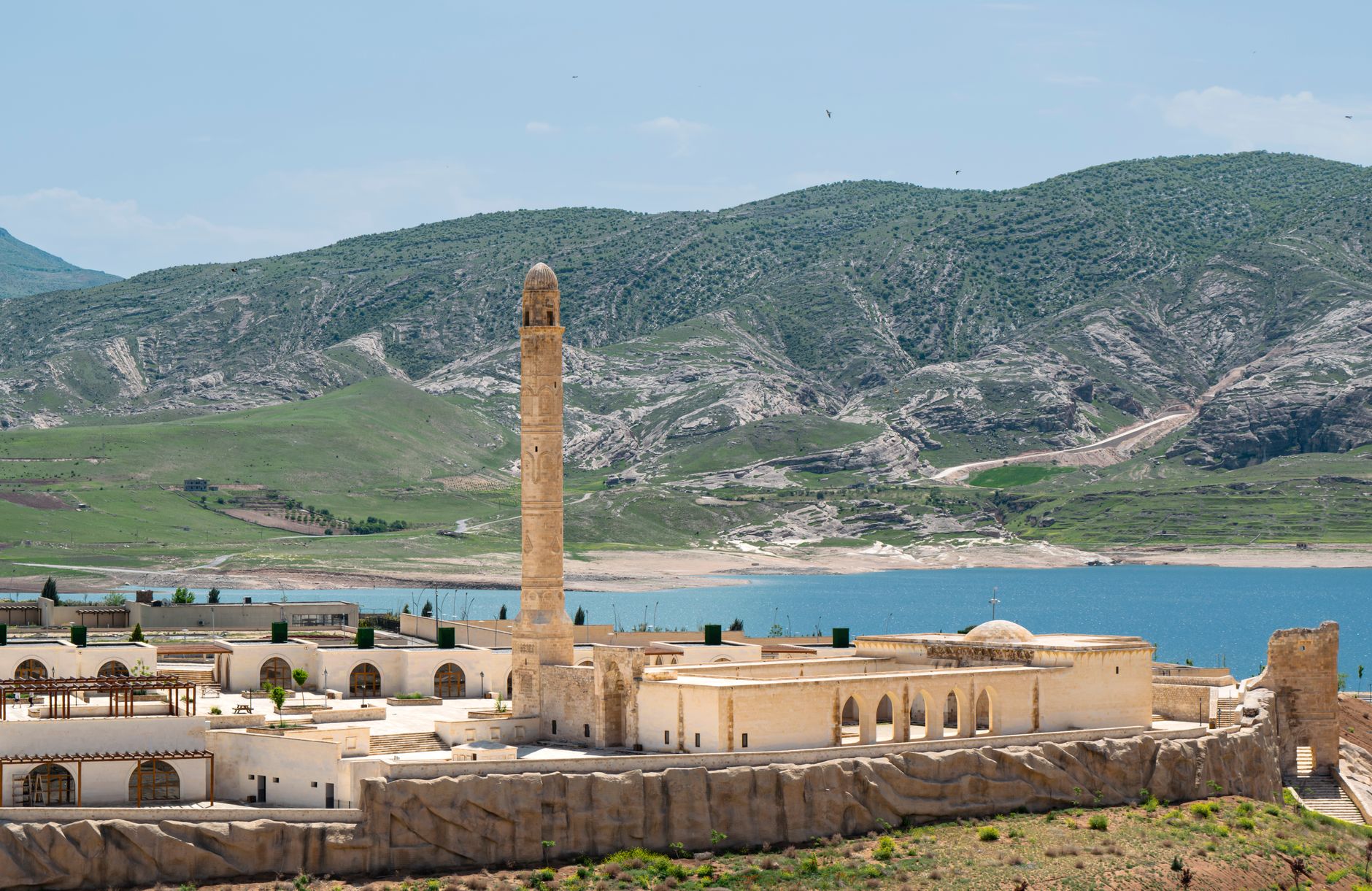 Beautiful view of the historic mosque minaret and surrounding landscape in Hasankeyf, Turkey.