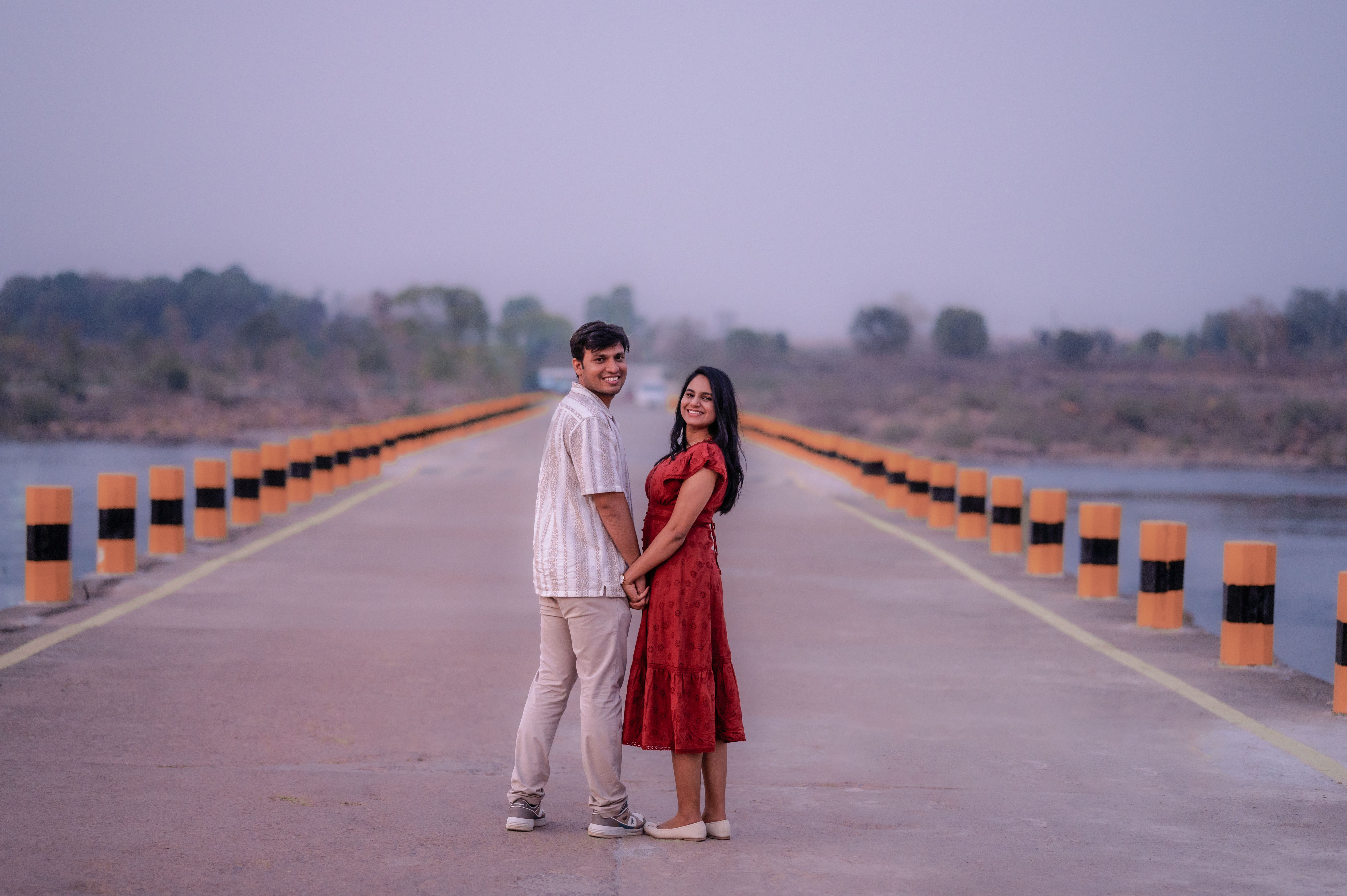 Romantic couple on scenic bridge