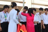 Students Receiving Medals at School Ceremony