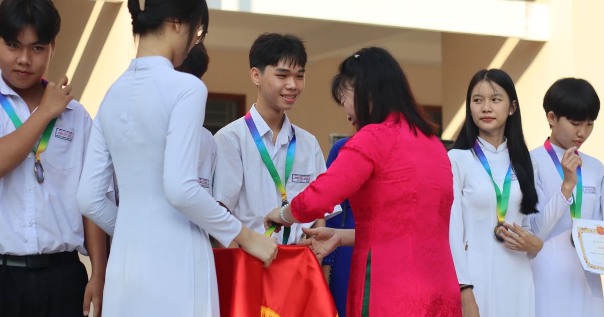 Building Credentials: A group of students receiving certificates at a fitness training academy