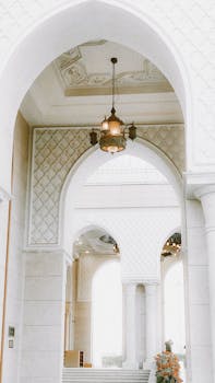 Beautiful arched design in a mosque featuring intricate Islamic architecture in Egypt.