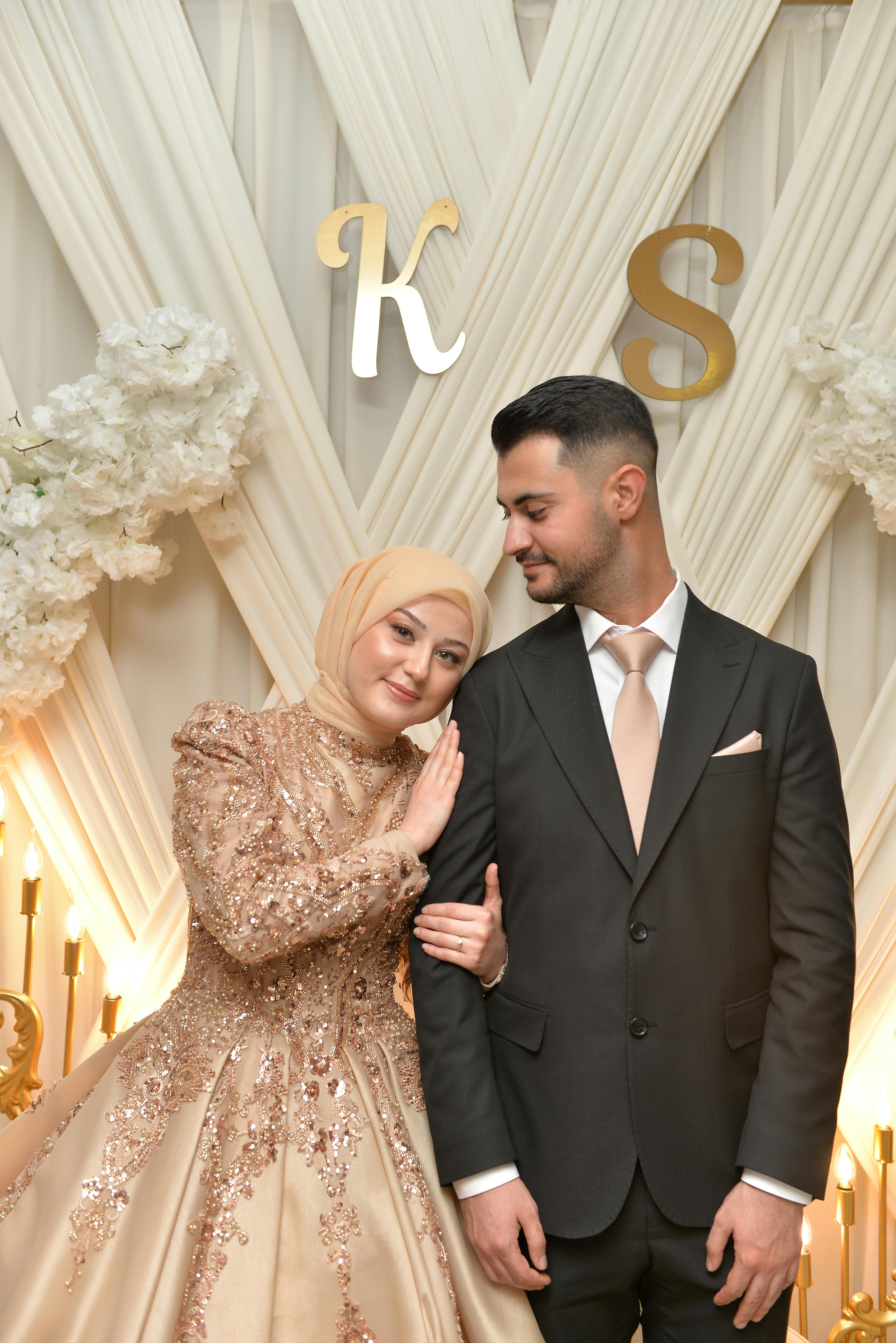 Beautiful wedding portrait of a bride and groom in elegant attire