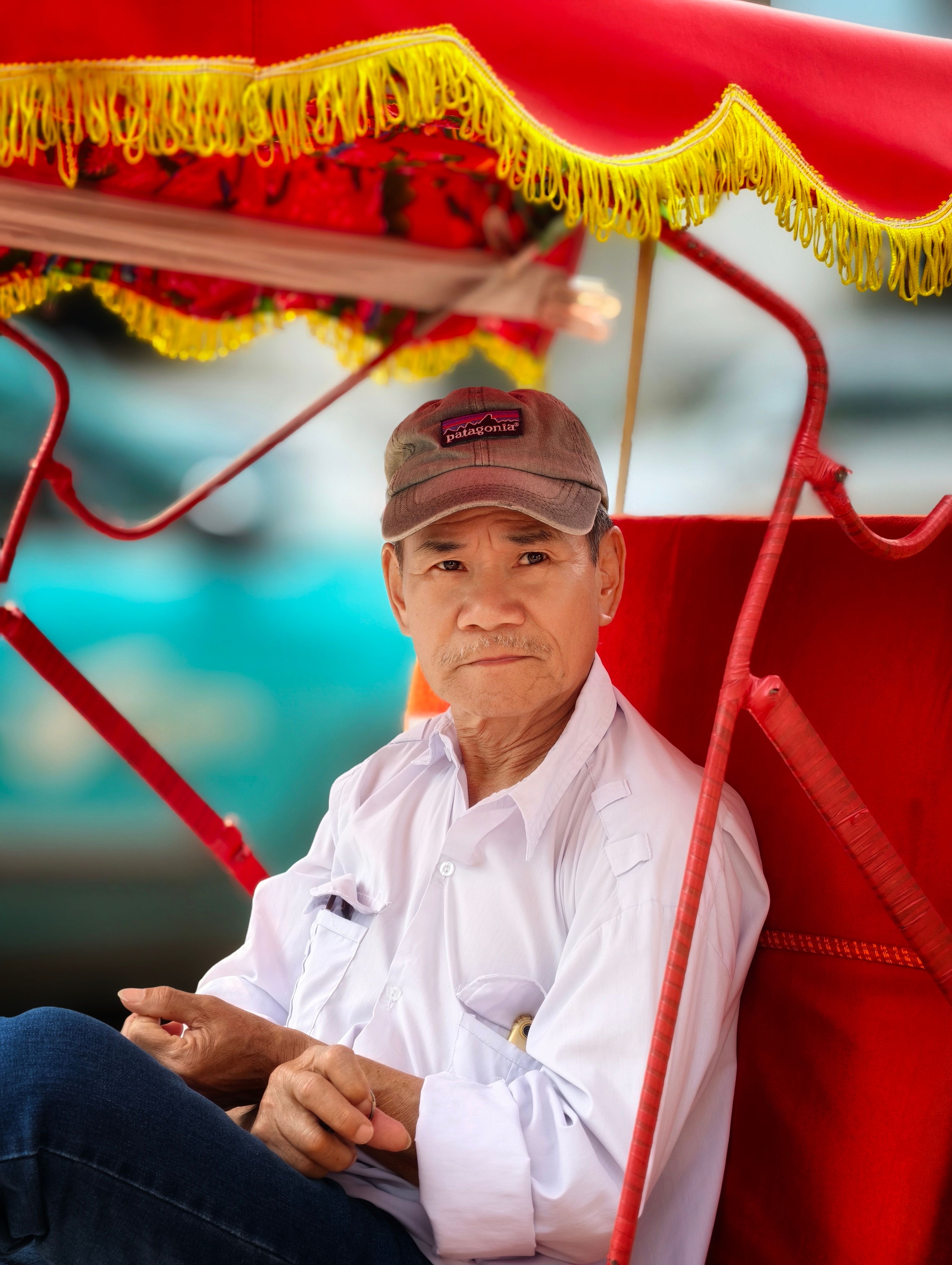 Portrait of Man in Traditional Rickshaw Outdoors · Free Stock Photo