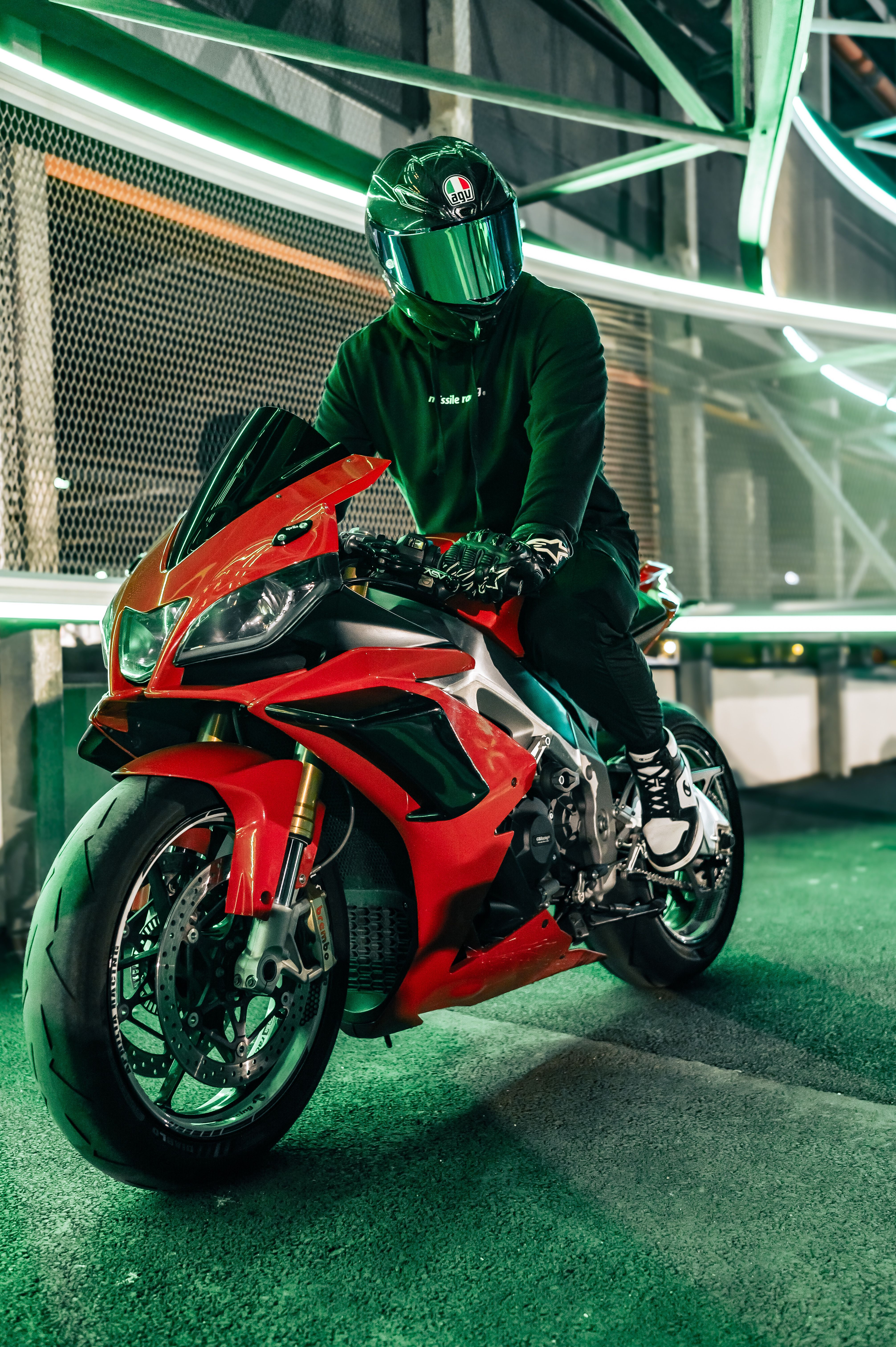 Urban Night Motorcycle Rider with Green Neon Lights · Free Stock Photo