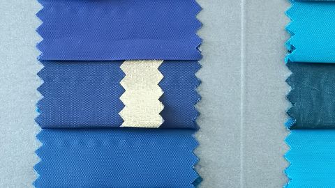 Collection of blue fabric swatches in different shades and textures for design inspiration.