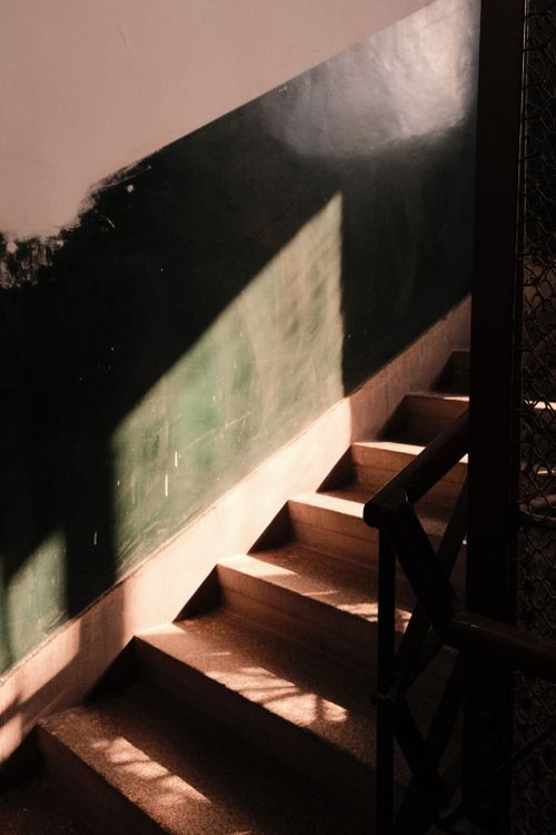 Free A staircase with dramatic lighting effect by sunlight, capturing urban architecture in Skopje, North Macedonia. Stock Photo