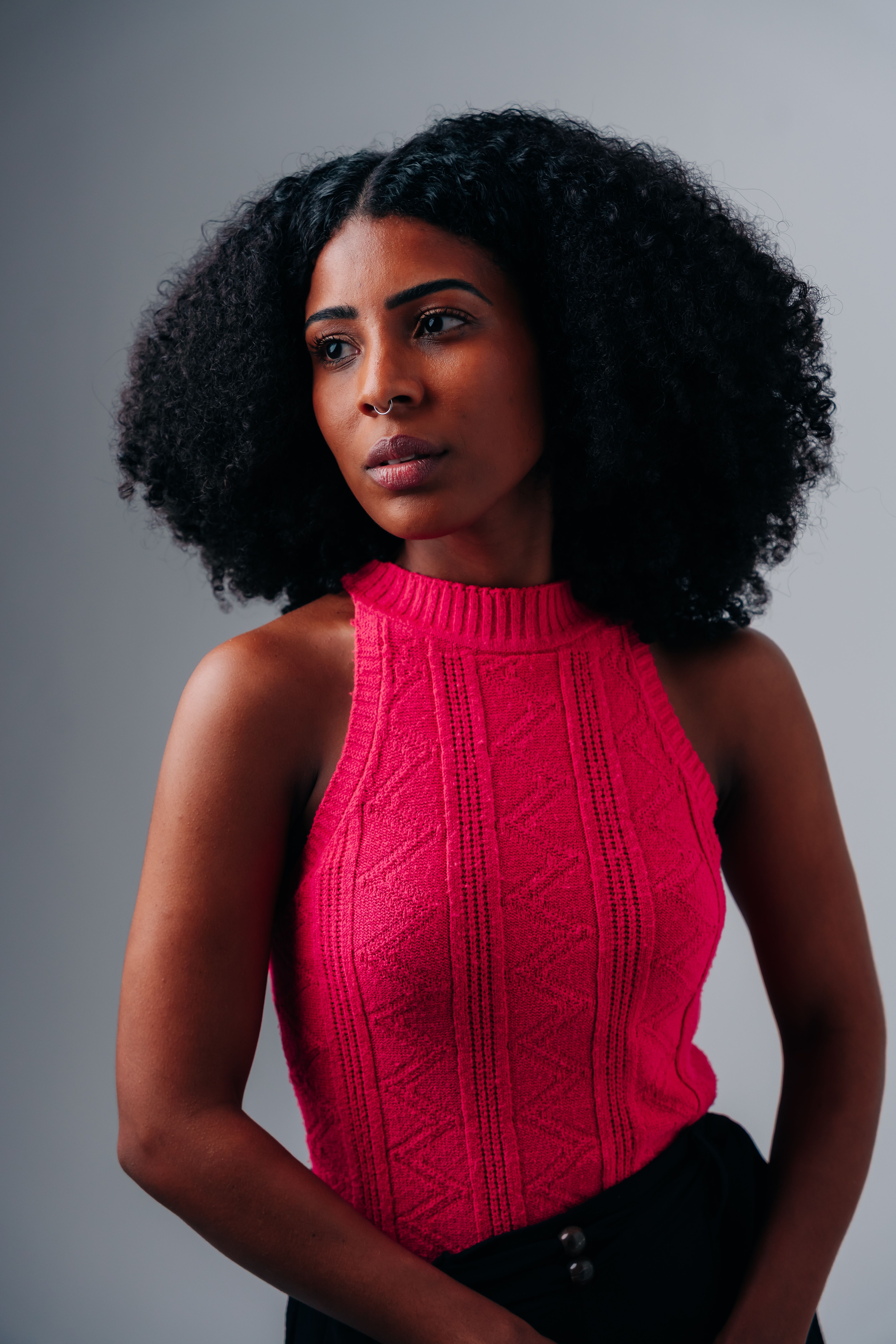 Pink knit sweater with denim skirt