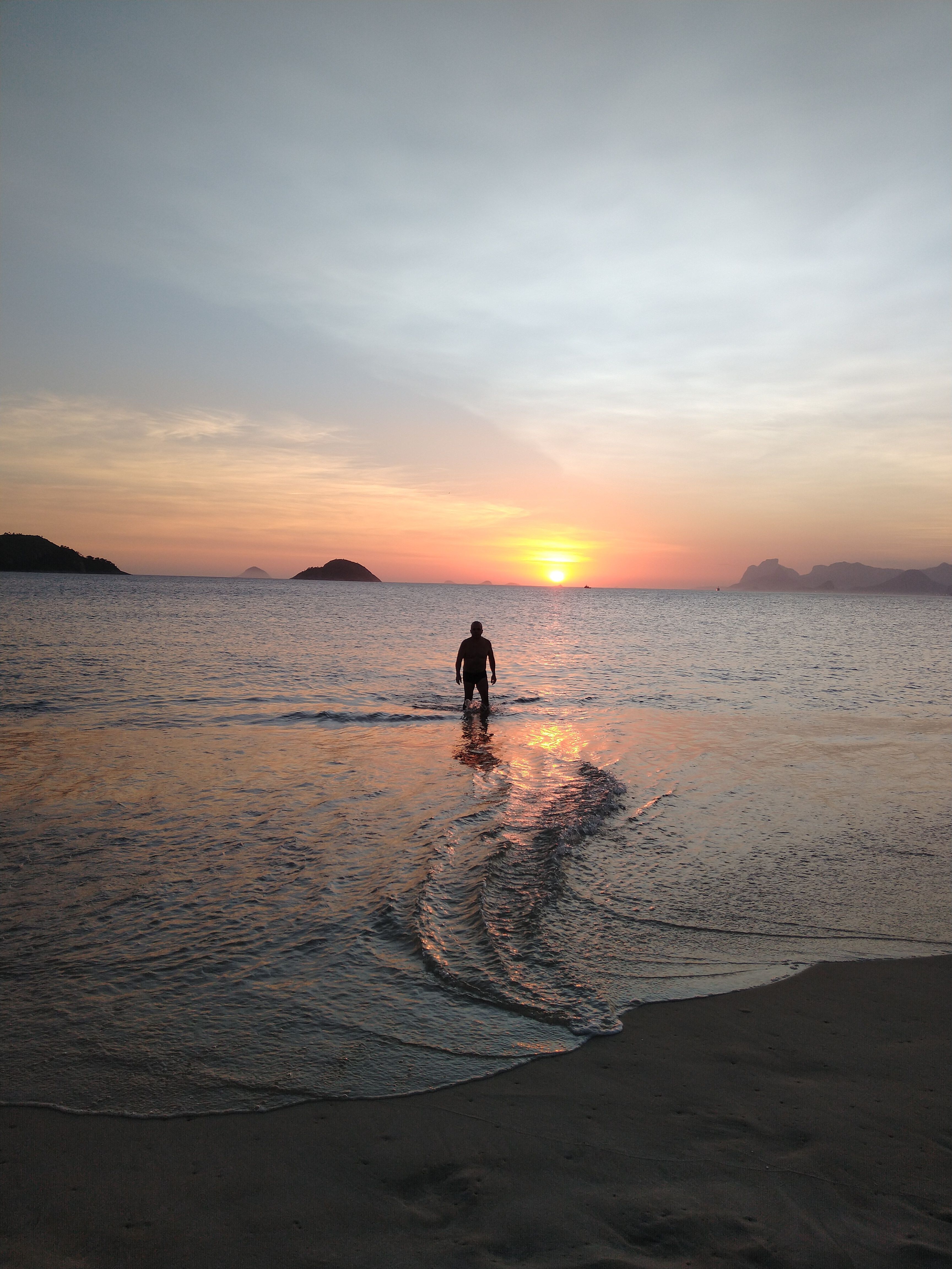 Silhouette of Person at Sunset on Tropical Beach · Free Stock Photo