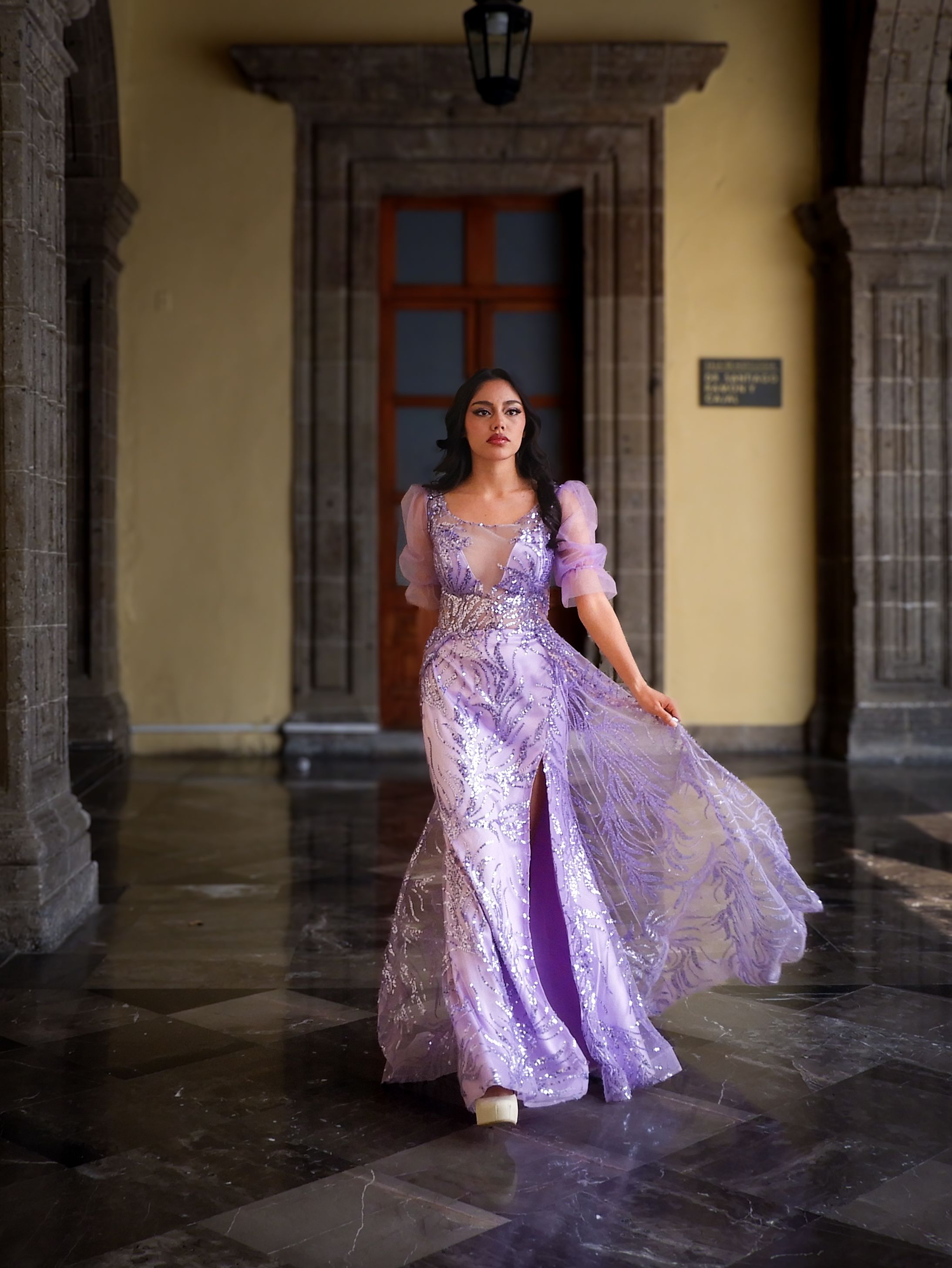 Elegant Woman in Lavender Dress in Historic Setting  Free Stock Photo