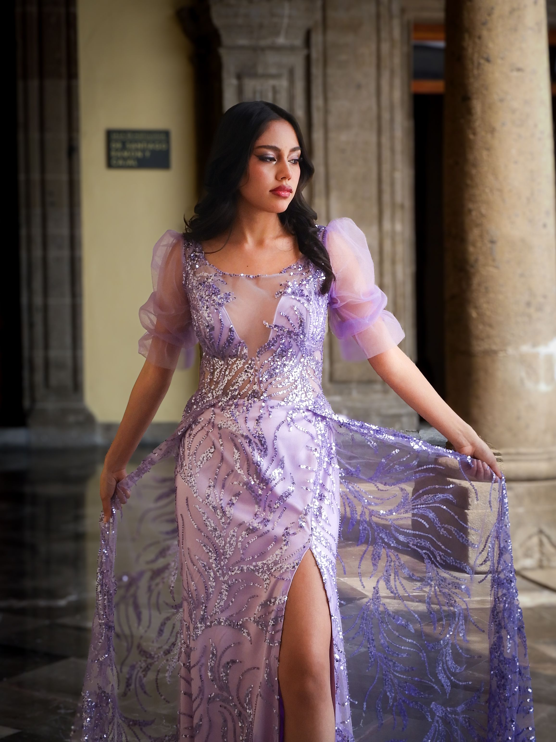 Elegant Woman in Lavish Lavender Gown in Historic Setting