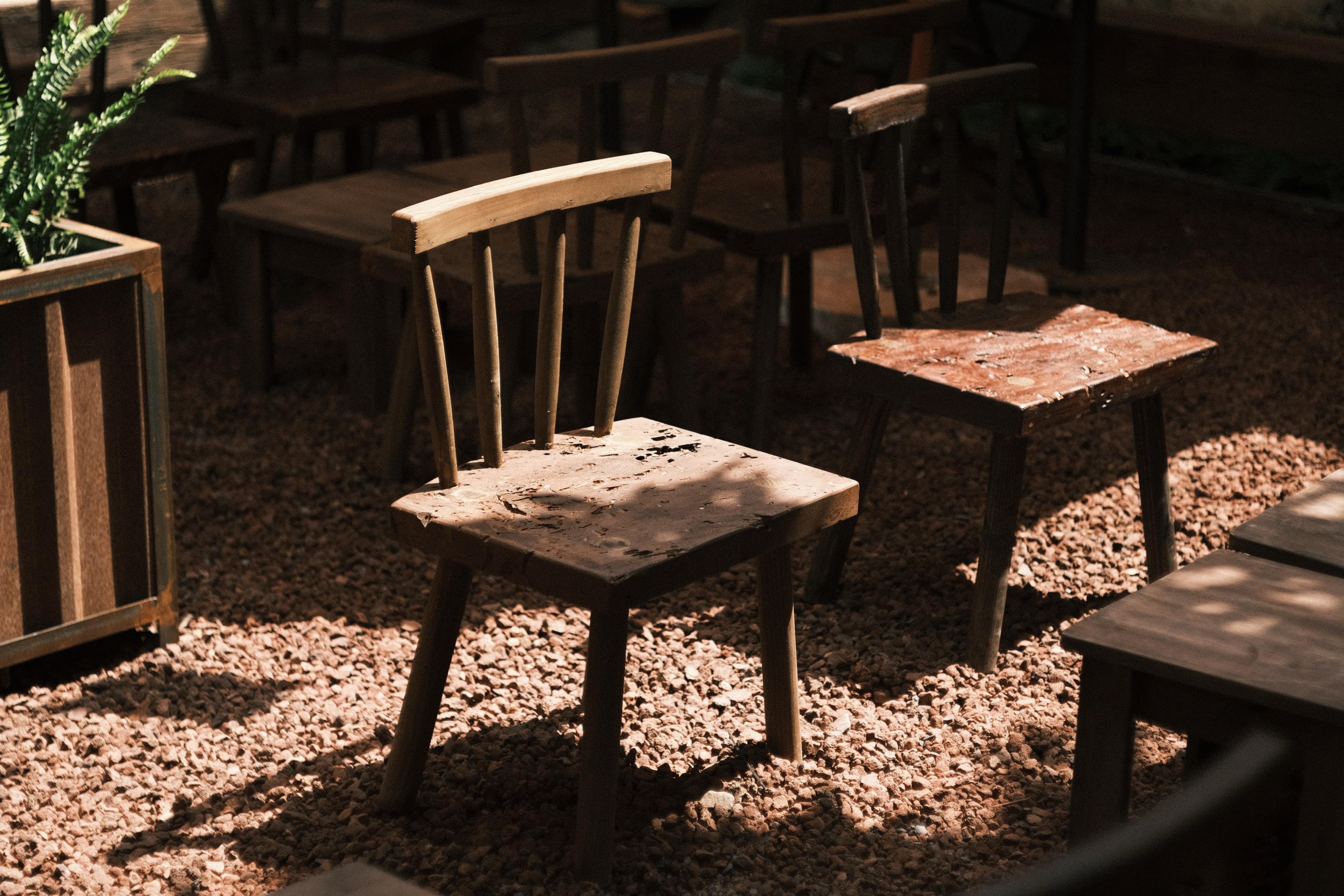 Rustic Wooden Chairs in Garden Setting · Free Stock Photo