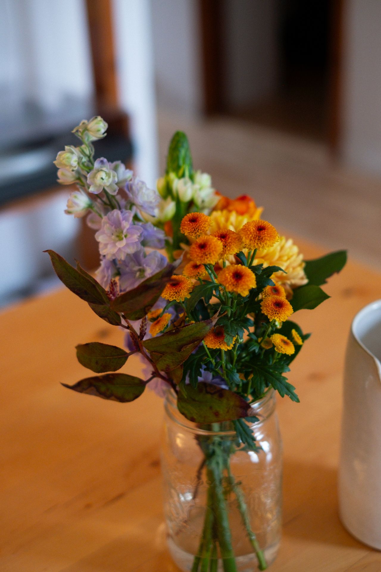 patriotic-mason-jar-centerpieces Fresh flowers arranged in a clear glass mason jar