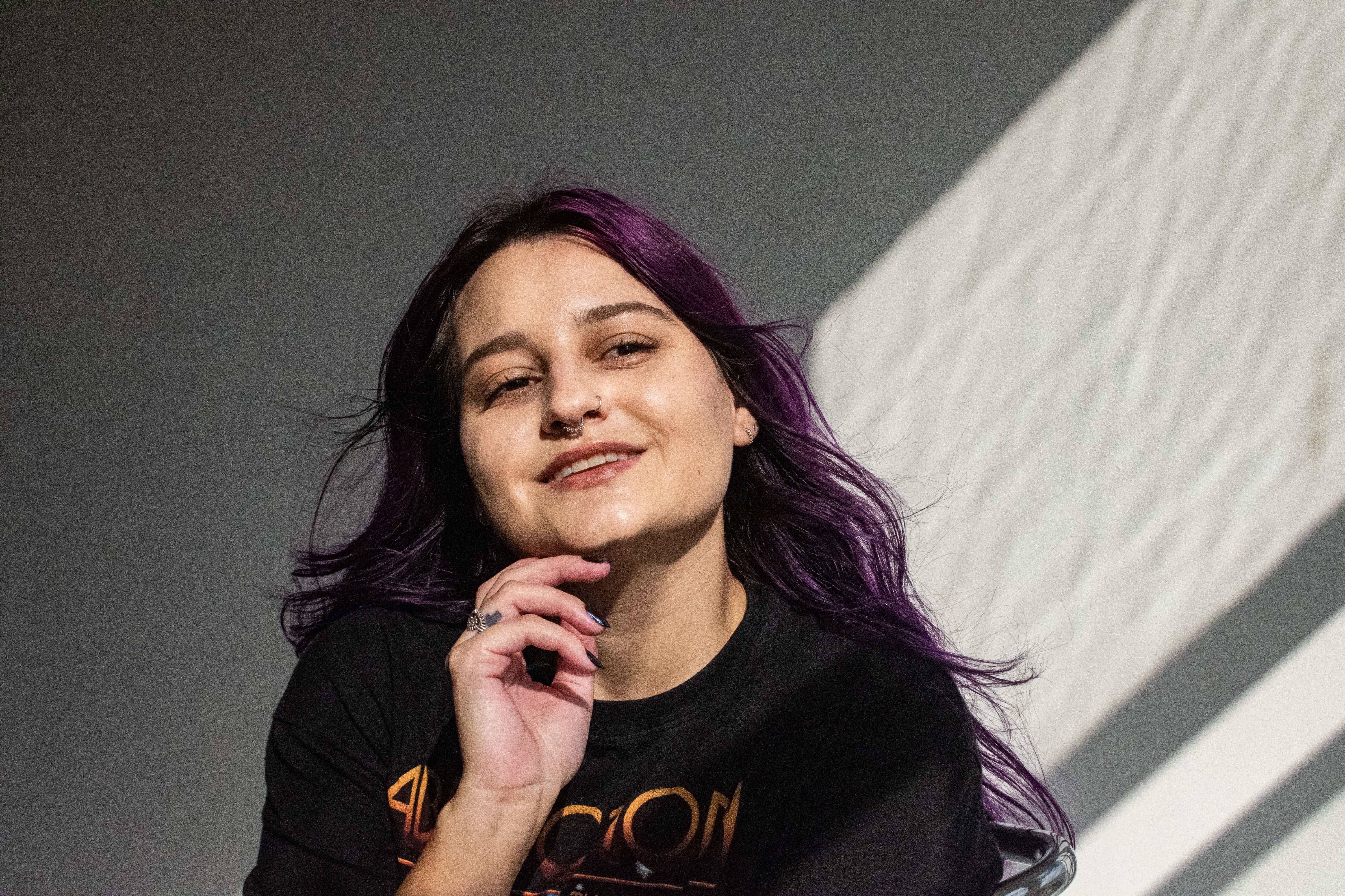 Portrait of a Woman with Purple Hair Smiling · Free Stock Photo