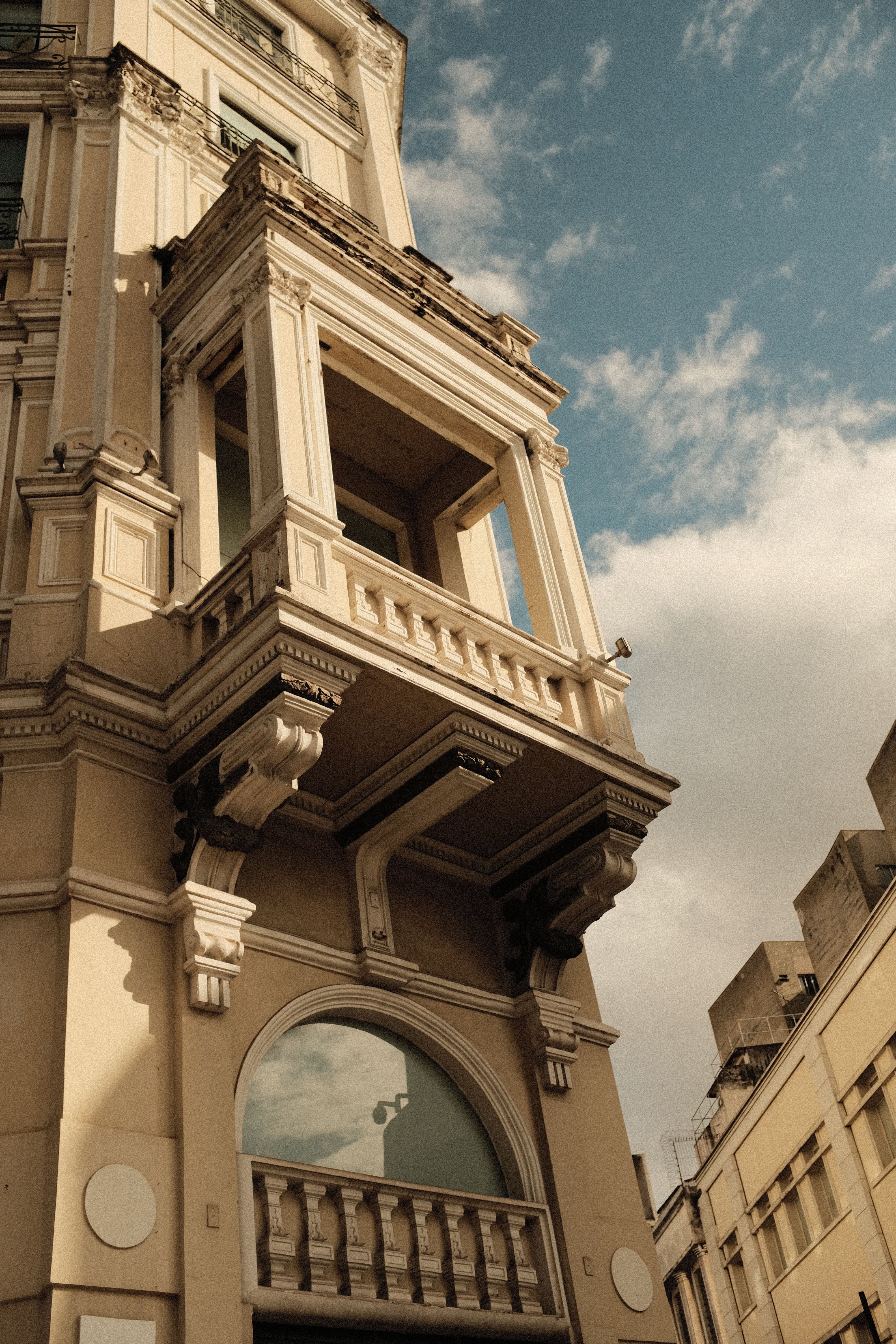 Elegant Architectural Facade Against Blue Sky · Free Stock Photo