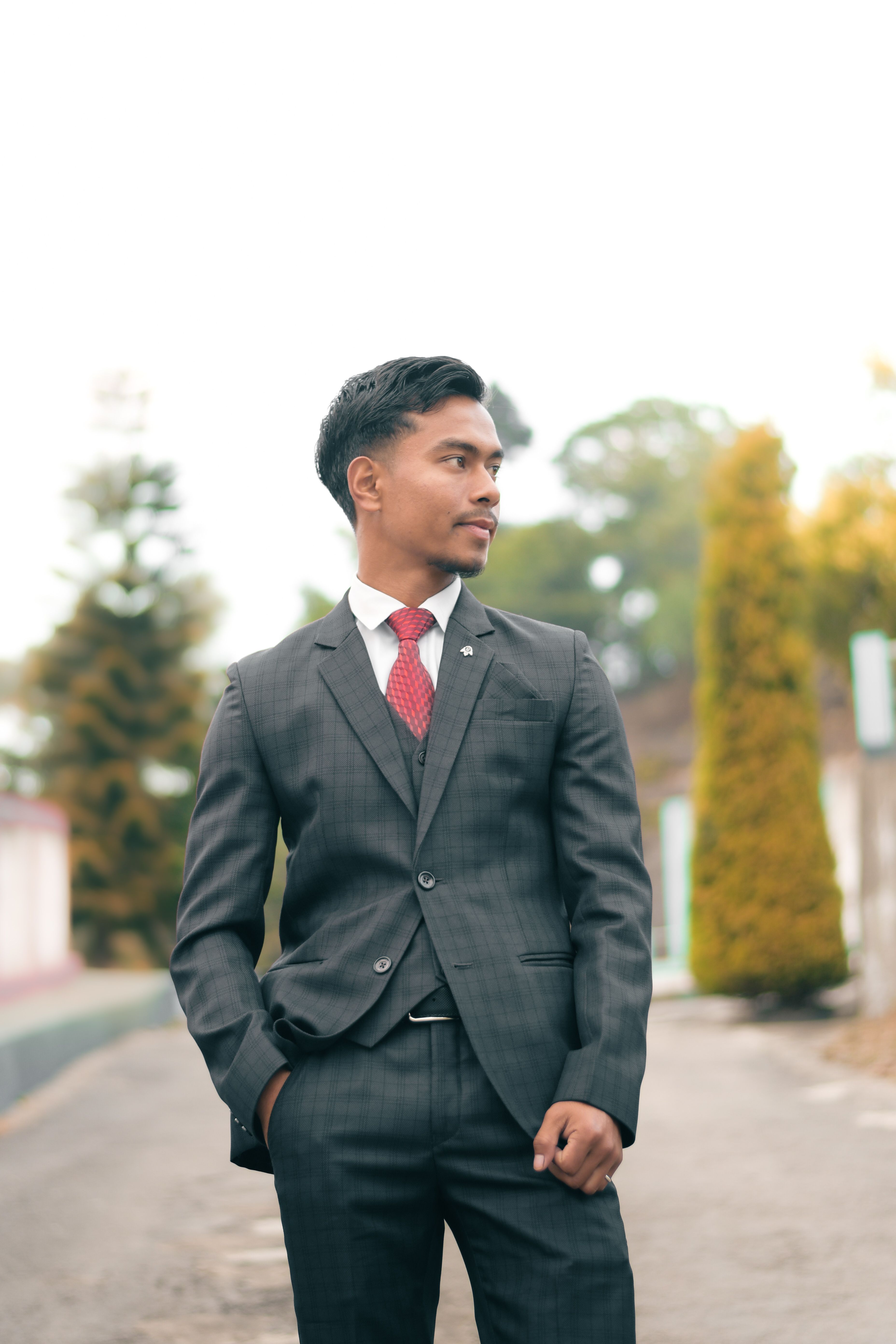 Confident Man in Gray Suit Outdoors  Free Stock Photo