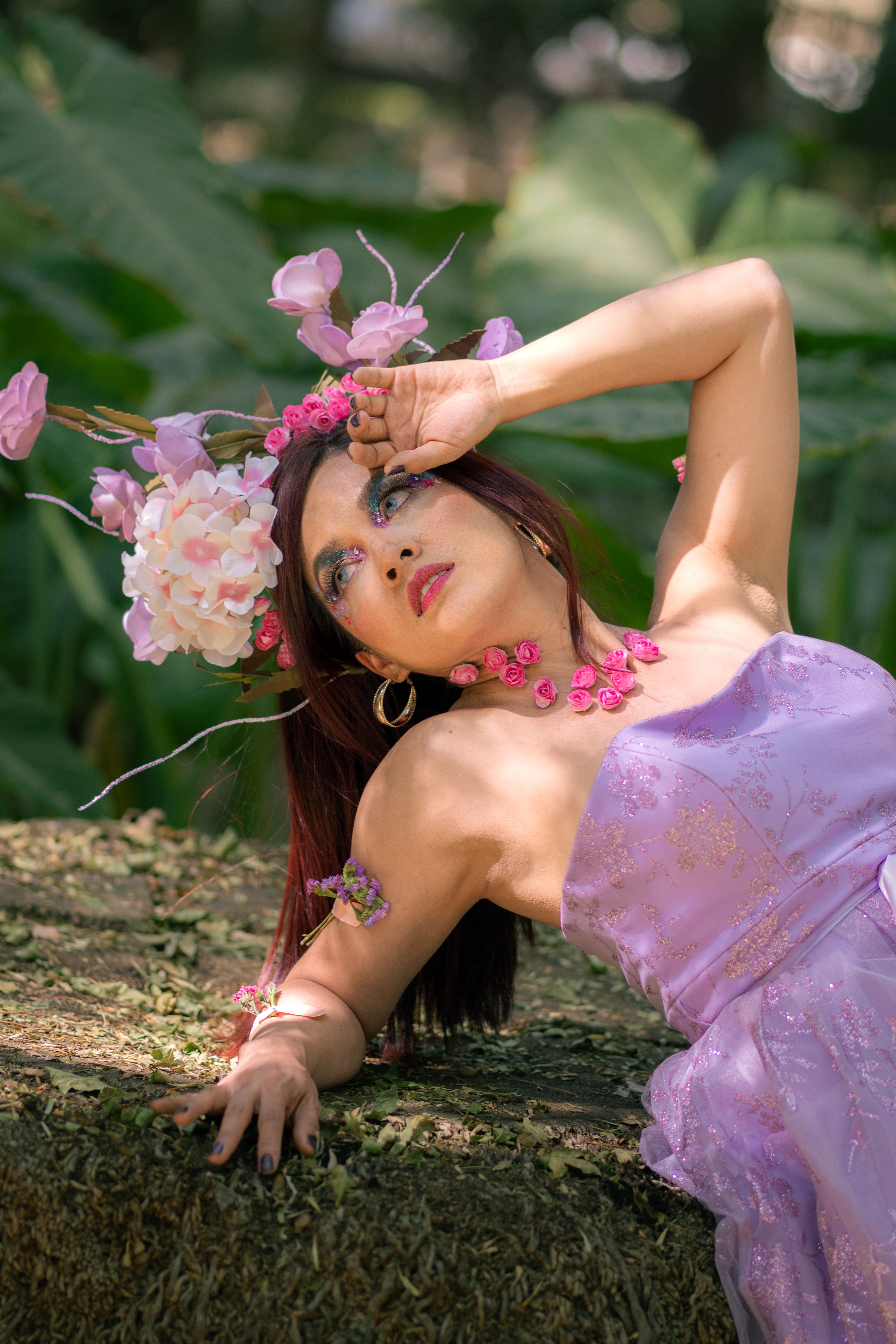 Elegant Woman in Floral Dress Outdoors · Free Stock Photo