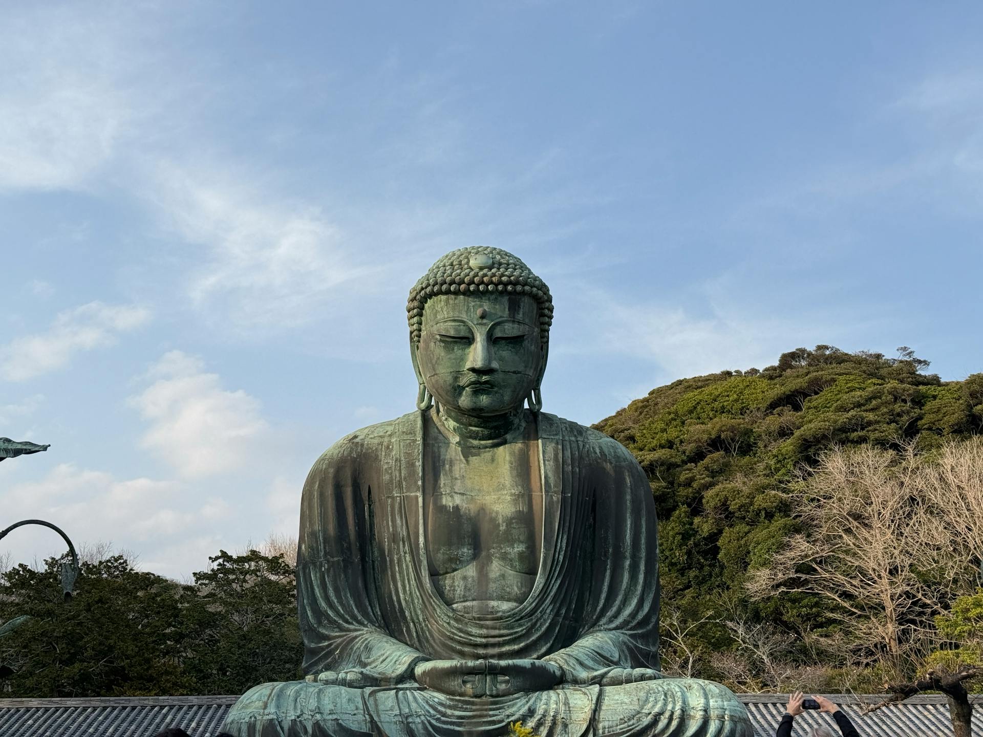 Majestic Great Buddha of Kamakura at Kotoku-in, Japan on a sunny spring day.