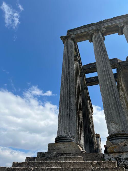 Free Explore the ancient temple ruins of Aizanoi in Kütahya, Türkiye, showcasing magnificent Greek architecture under a vibrant sky. Stock Photo