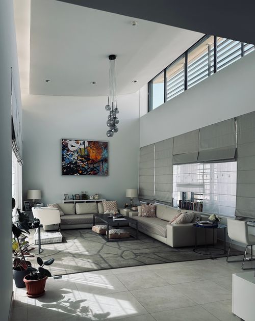 Free Sophisticated modern living room interior with minimalist decor and natural light ambiance. Stock Photo