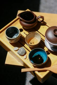 Discover the artistry of traditional Chinese tea with a beautifully arranged Gong Fu set on a wooden tray.