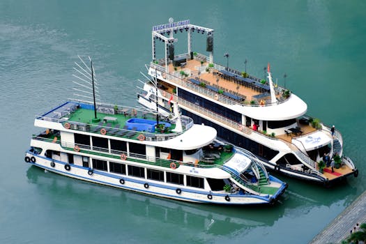 Two luxury cruise boats docked on calm waters, ideal for travel and leisure themes.