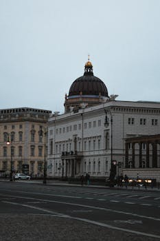 Historic architecture in Berlin, showcasing classic European design with a prominent dome.